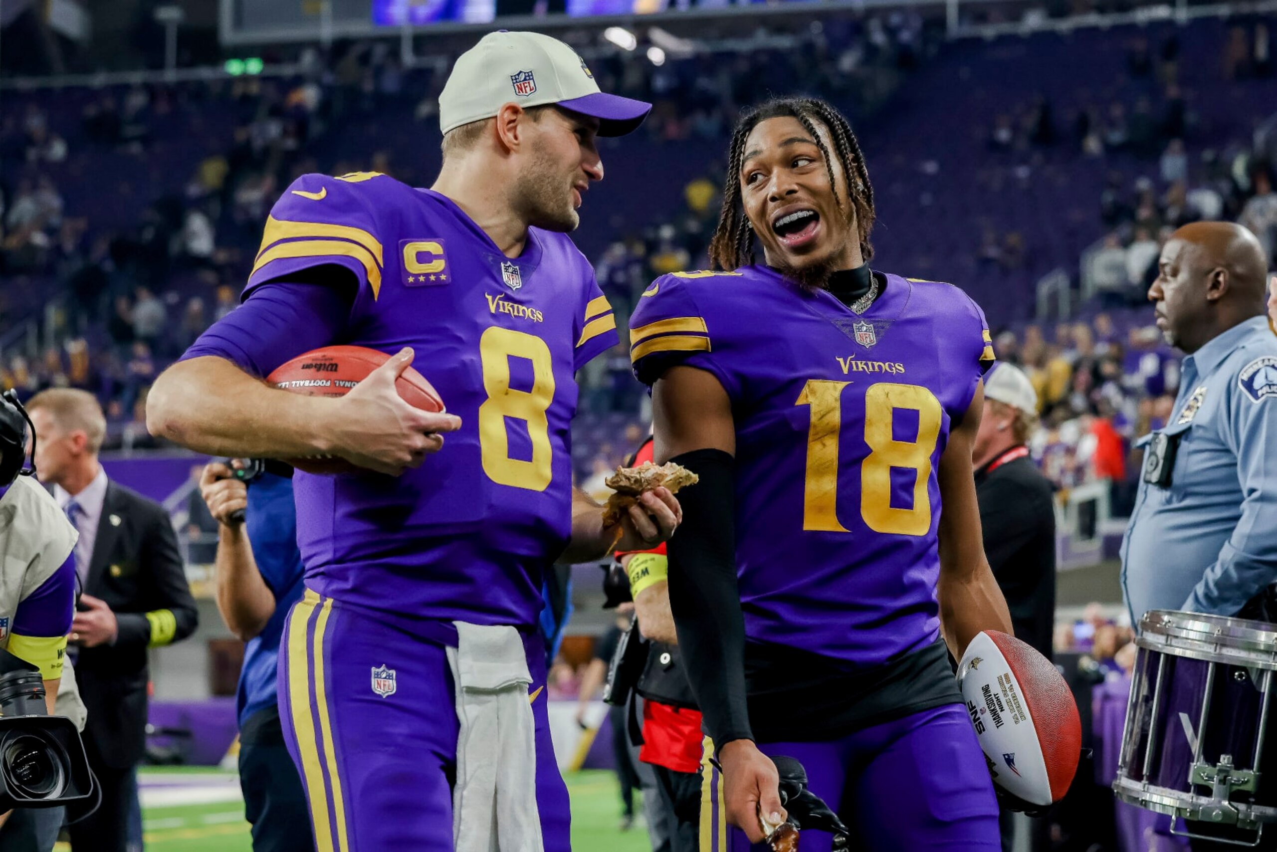 Kirk Cousins (left) and Justin Jefferson (right)