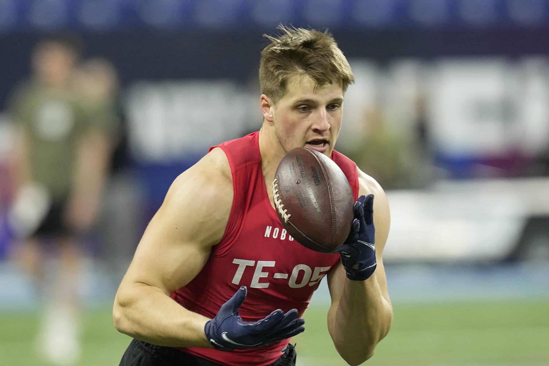 South Dakota State tight end Tucker Kraft runs a drill at the NFL football scouting combine in Indianapolis, Saturday, March 4, 2023. (AP Photo/Darron Cummings)
