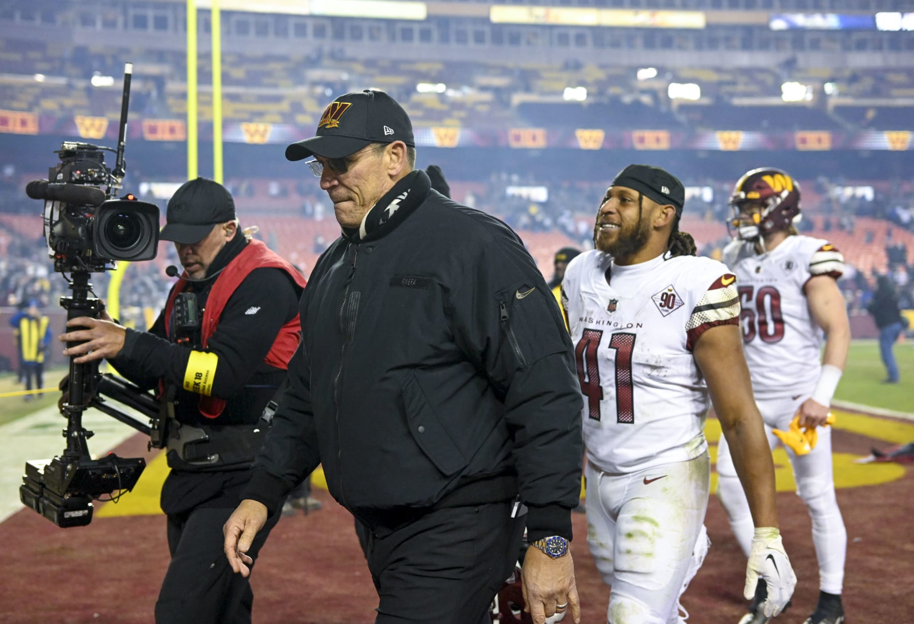 LANDOVER, MD - JANUARY 8: Washington Commanders head coach Ron Rivera leaves the field after winning the game against the Dallas Cowboys at FedEx Field on January 8, 2023. (Photo by John McDonnell/The Washington Post via Getty Images)