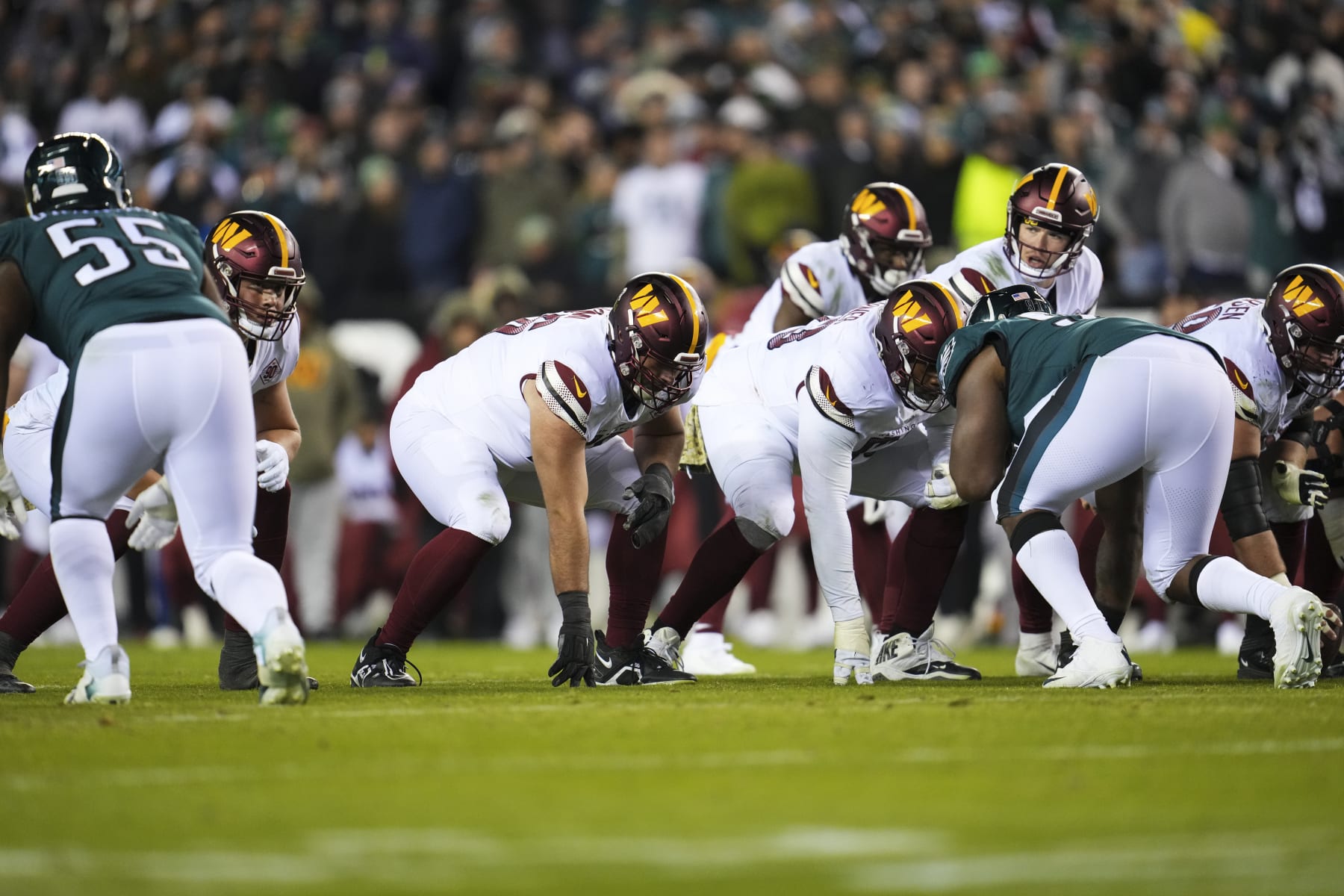 PHILADELPHIA, PA - NOVEMBER 14: Sam Cosmi #76 of the Washington Commanders gets set against the Philadelphia Eagles at Lincoln Financial Field on November 14, 2022 in Philadelphia. (Photo by Cooper Neill/Getty Images)
