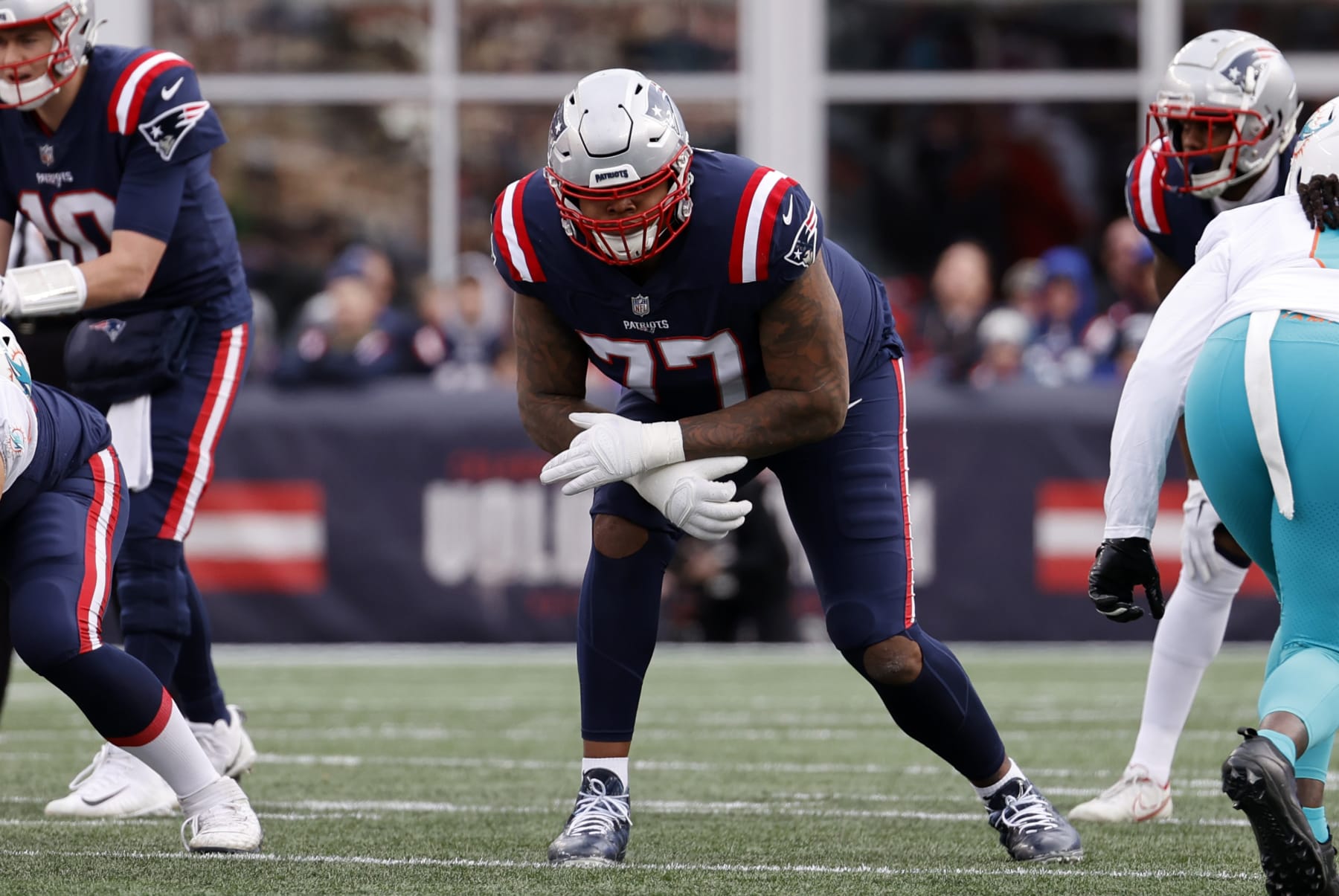 FOXBOROUGH, MA - JANUARY 01: New England Patriots offensive tackle Trent Brown (77) during a game between the New England Patriots and the Miami Dolphins on January 1, 2023, at Gillette Stadium in Foxboro, Massachusetts. (Photo by Fred Kfoury III/Icon Sportswire via Getty Images)