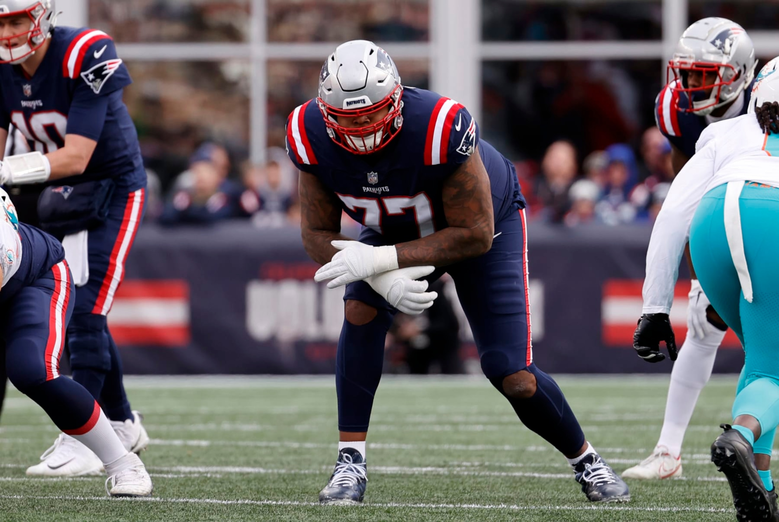 FOXBOROUGH, MA - JANUARY 01: New England Patriots offensive tackle Trent Brown (77) during a game between the New England Patriots and the Miami Dolphins on January 1, 2023, at Gillette Stadium in Foxboro, Massachusetts. (Photo by Fred Kfoury III/Icon Sportswire via Getty Images)