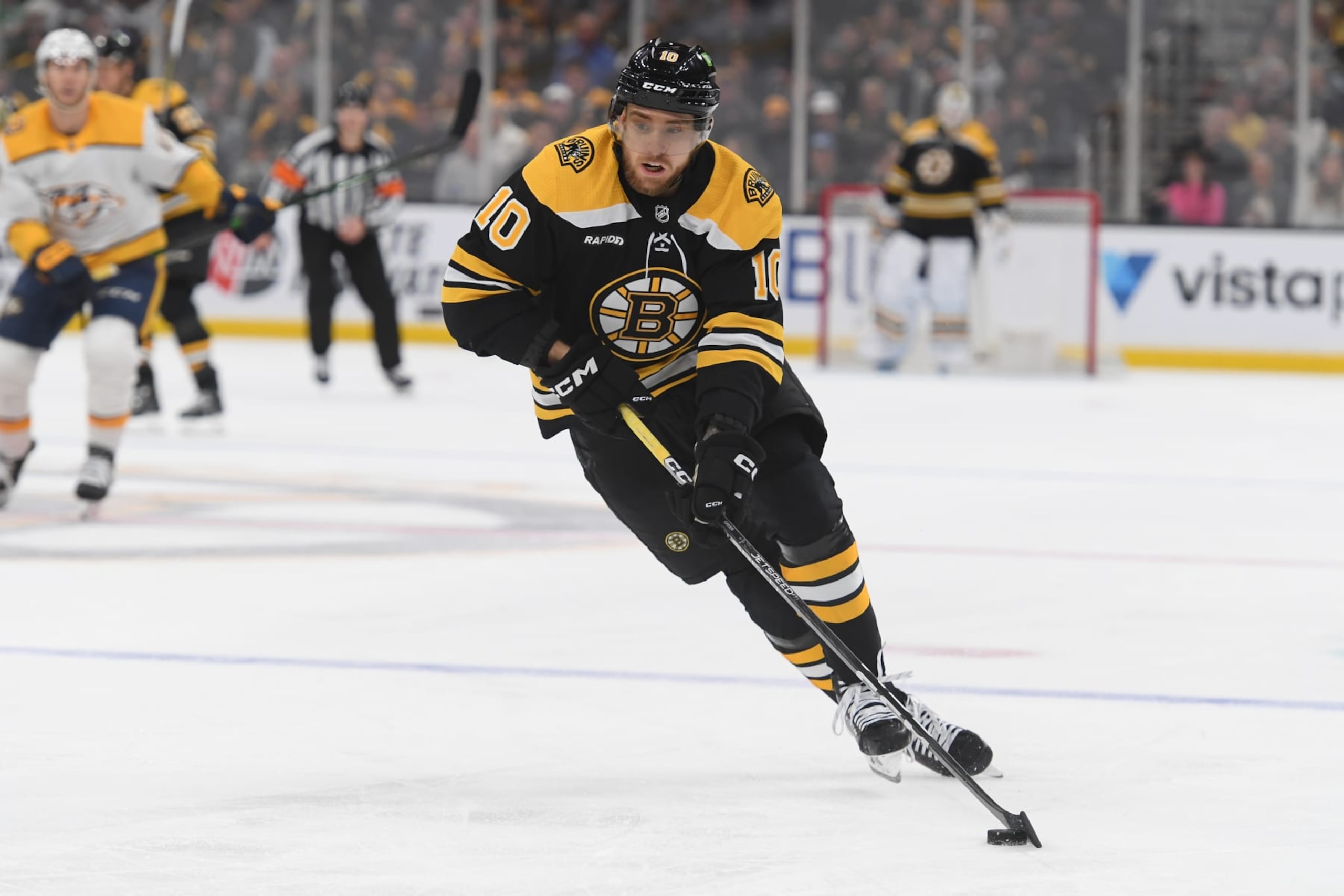 BOSTON, MASSACHUSETTS - MARCH 28: A.J. Greer #10 of the Boston Bruins skates with the puck against the Nashville Predators at the TD Garden on March 28, 2023 in Boston, Massachusetts. (Photo by Steve Babineau/NHLI via Getty Images)