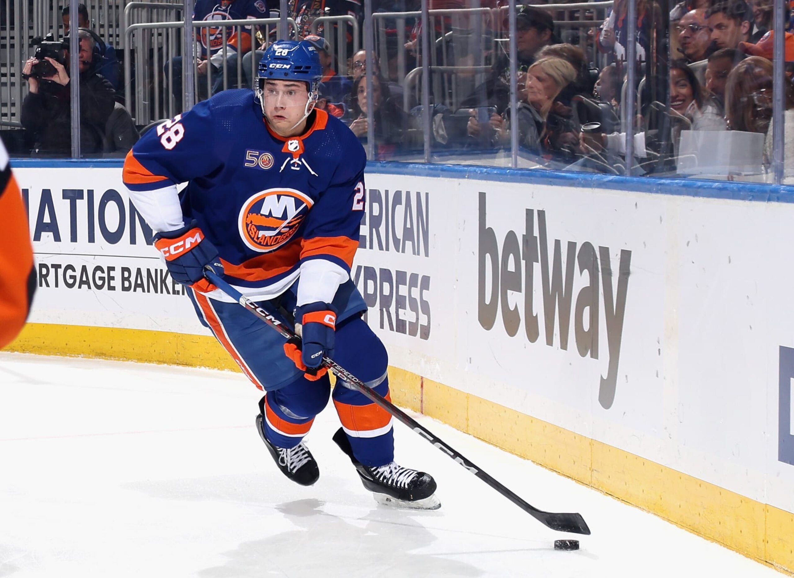 ELMONT, NEW YORK - MARCH 27: Alexander Romanov #28 of the New York Islanders skates against the New Jersey Devils at the UBS Arena on March 27, 2023 in Elmont, New York. (Photo by Bruce Bennett/Getty Images)