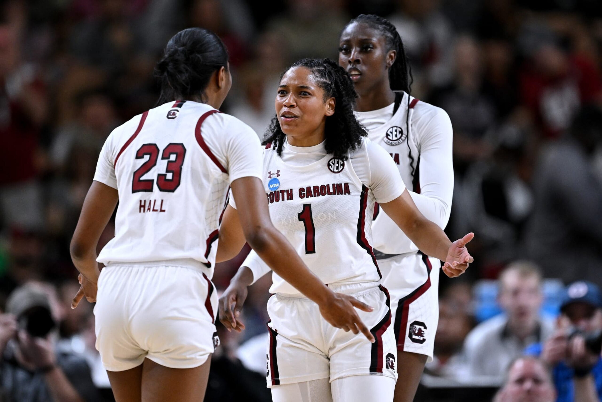 GREENVILLE, SOUTH CAROLINA - MARCH 27: Bree Hall #23 and Zia Cooke #1 of the South Carolina Gamecocks react late in the fourth quarter of a win against the Maryland Terrapins during the Elite Eight round of the 2023 NCAA Women's Basketball Tournament held at Bon Secours Wellness Arena on March 27, 2023 in Greenville, South Carolina. (Photo by Grant Halverson/NCAA Photos via Getty Images)