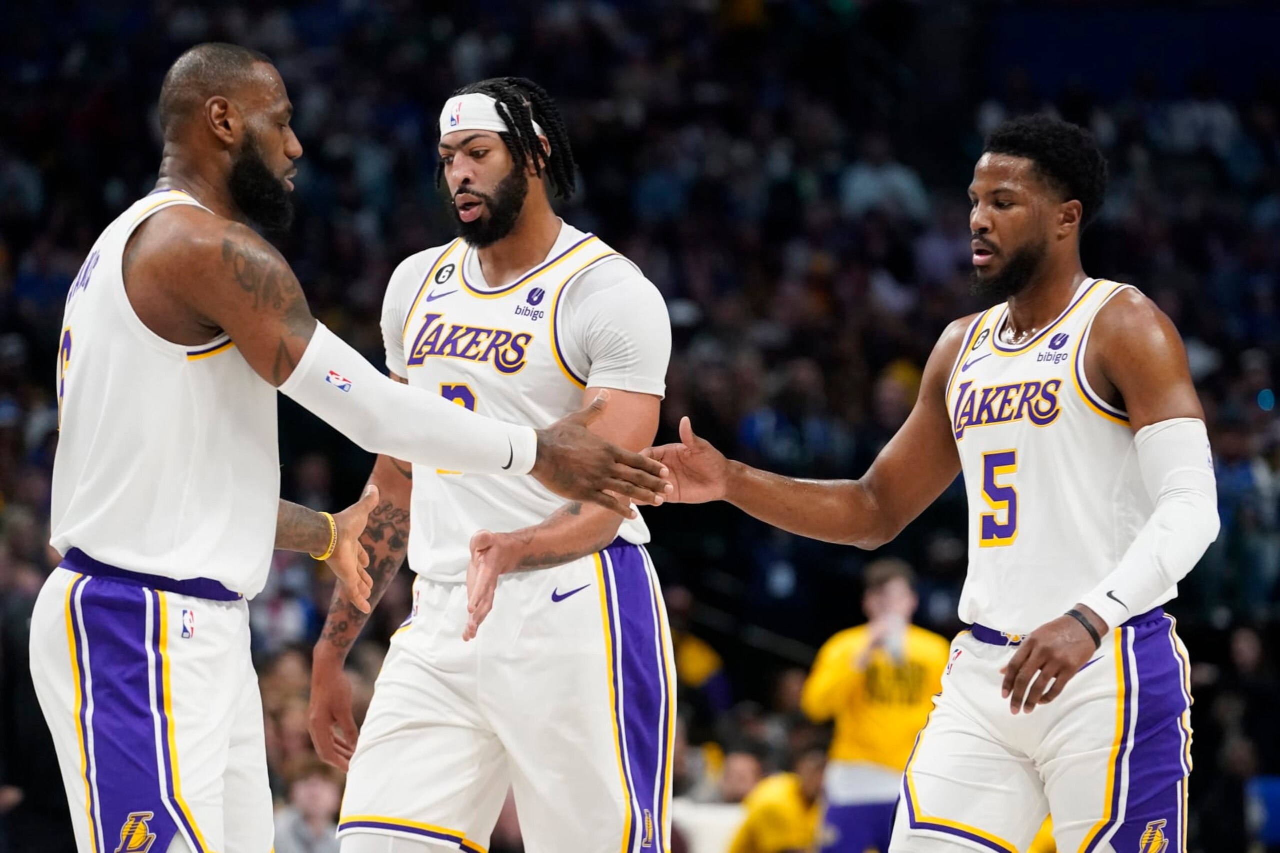 Los Angeles Lakers guard Malik Beasley (5) and forward Anthony Davis (3) get a congrats from teammate forward LeBron James (6) during the first quarter of an NBA basketball game against the Dallas Mavericks in Dallas, Sunday, Feb. 26, 2023. (AP Photo/LM Otero) Los Angeles Lakers guard Malik Beasley (5) and forward Anthony Davis (3) get a congrats from teammate forward LeBron James (6) during the first quarter of an NBA basketball game against the Dallas Mavericks in Dallas, Sunday, Feb. 26, 2023. (AP Photo/LM Otero)