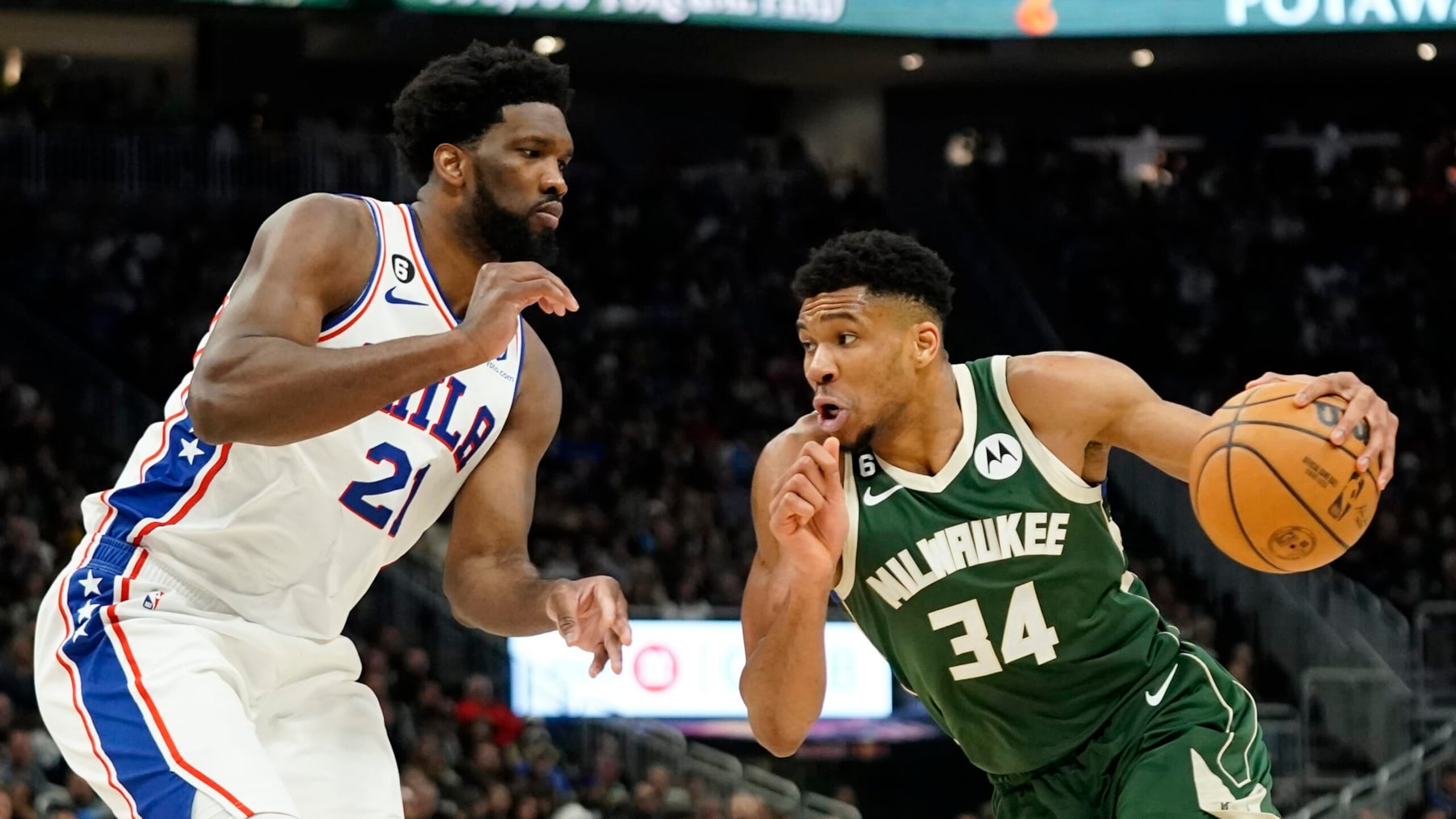 Milwaukee Bucks' Giannis Antetokounmpo drives to the basket against Philadelphia 76ers' Joel Embiid during the second half of an NBA basketball game Saturday, March 4, 2023, in Milwaukee. (AP Photo/Aaron Gash)