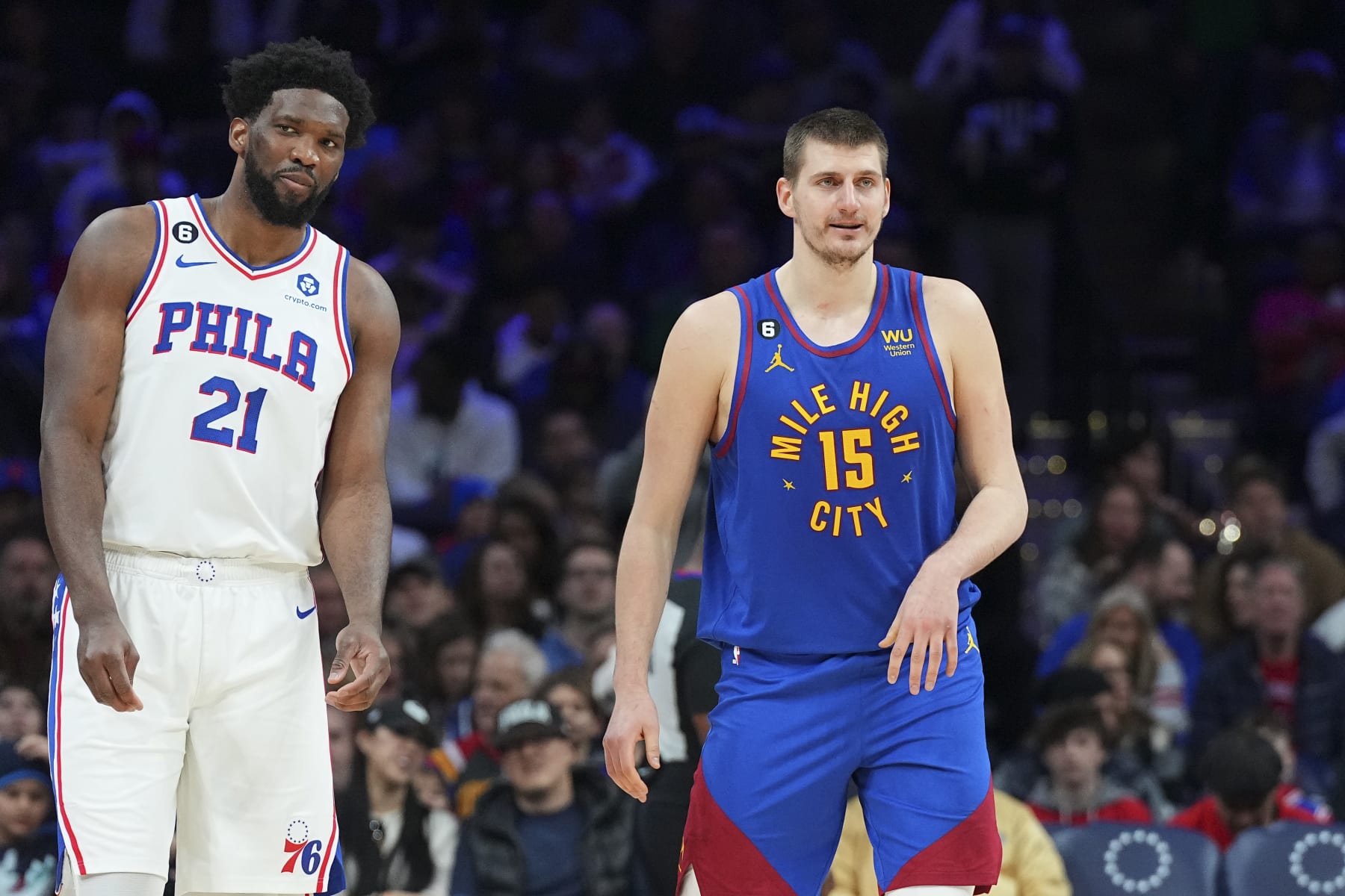 PHILADELPHIA, PA - JANUARY 28: Joel Embiid #21 of the Philadelphia 76ers and Nikola Jokic #15 of the Denver Nuggets in action at the Wells Fargo Center on January 28, 2023 in Philadelphia, Pennsylvania. NOTE TO USER: User expressly acknowledges and agrees that, by downloading and or using this photograph, User is consenting to the terms and conditions of the Getty Images License Agreement. (Photo by Mitchell Leff/Getty Images)