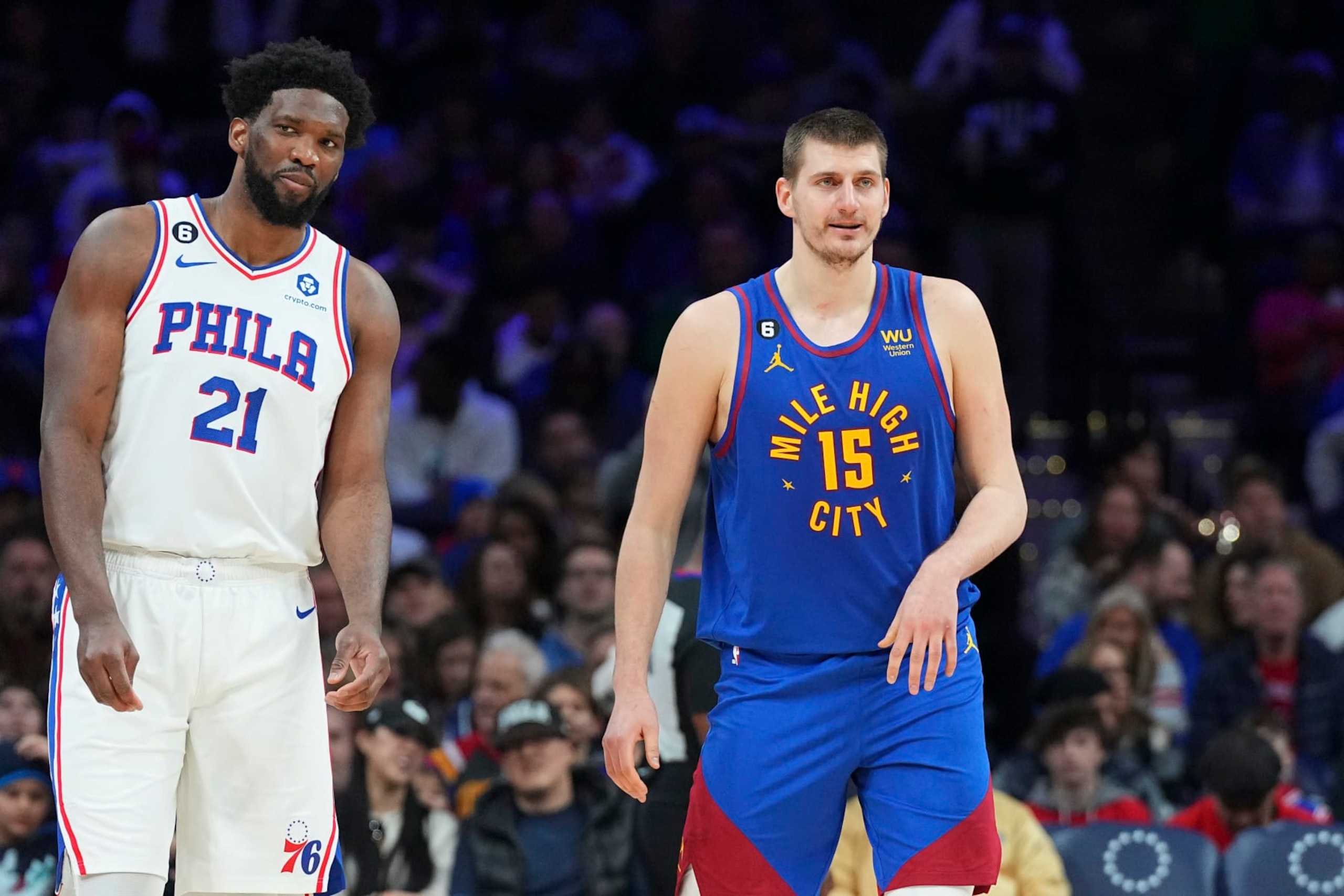 PHILADELPHIA, PA - JANUARY 28: Joel Embiid #21 of the Philadelphia 76ers and Nikola Jokic #15 of the Denver Nuggets in action at the Wells Fargo Center on January 28, 2023 in Philadelphia, Pennsylvania. NOTE TO USER: User expressly acknowledges and agrees that, by downloading and or using this photograph, User is consenting to the terms and conditions of the Getty Images License Agreement. (Photo by Mitchell Leff/Getty Images)