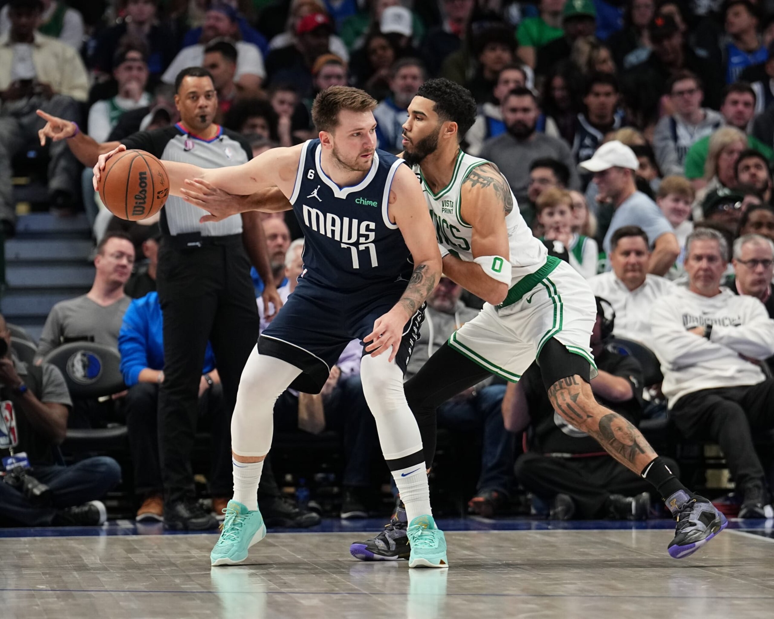DALLAS, TX - JANUARY 5: Jayson Tatum #0 of the Boston Celtics guards Luka Doncic #77 of the Dallas Mavericks during the game between the Boston Celtics and the Dallas Mavericks on January 5, 2022 at the American Airlines Center in Dallas, Texas. NOTE TO USER: User expressly acknowledges and agrees that, by downloading and or using this photograph, User is consenting to the terms and conditions of the Getty Images License Agreement. Mandatory Copyright Notice: Copyright 2023 NBAE (Photo by Glenn James/NBAE via Getty Images)