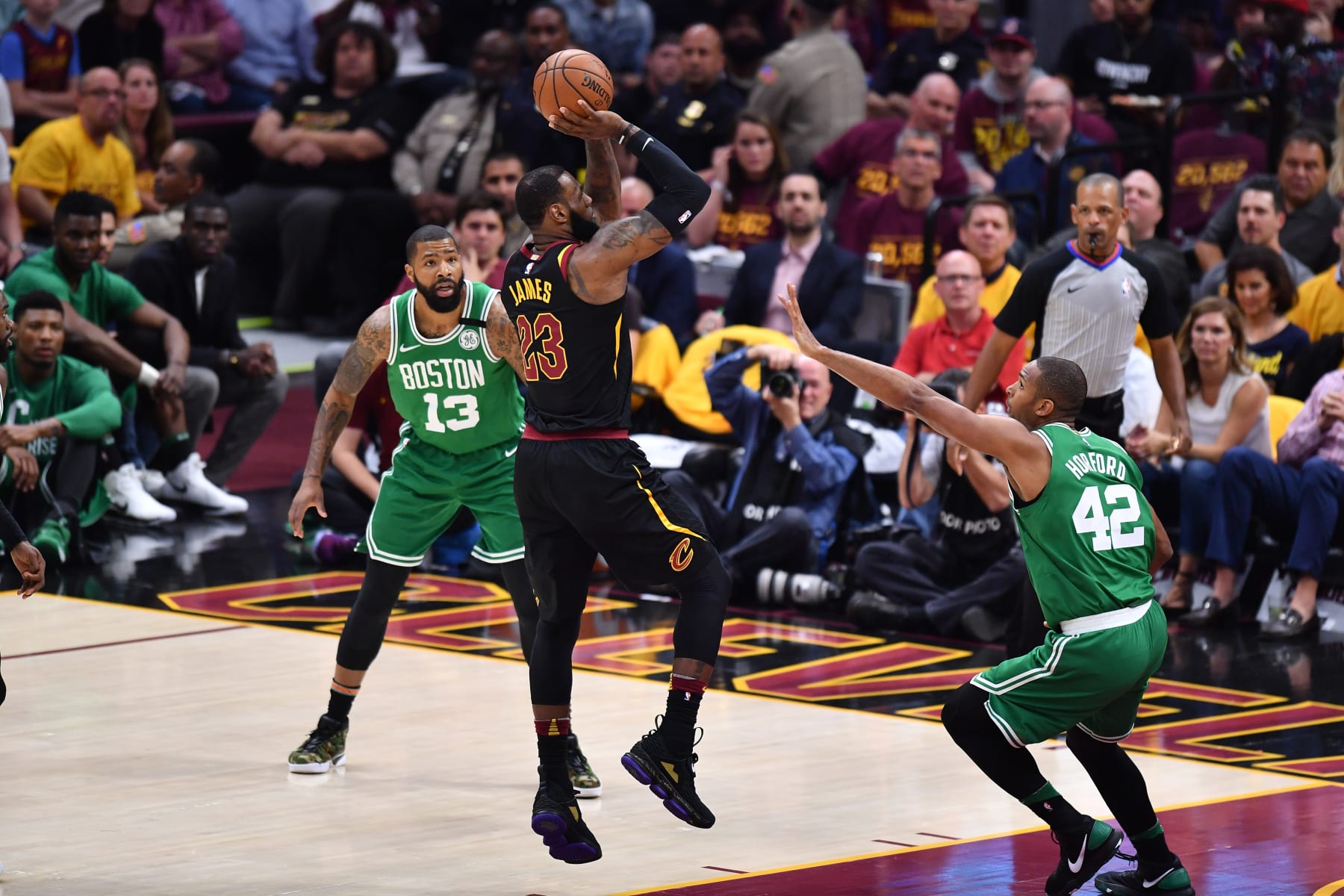 CLEVELAND, OH - MAY 21: LeBron James #23 of the Cleveland Cavaliers shoots against Al Horford #42 of the Boston Celtics in the first half during Game Four of the 2018 NBA Eastern Conference Finals at Quicken Loans Arena on May 21, 2018 in Cleveland, Ohio. NOTE TO USER: User expressly acknowledges and agrees that, by downloading and or using this photograph, User is consenting to the terms and conditions of the Getty Images License Agreement.  (Photo by Jamie Sabau/Getty Images)