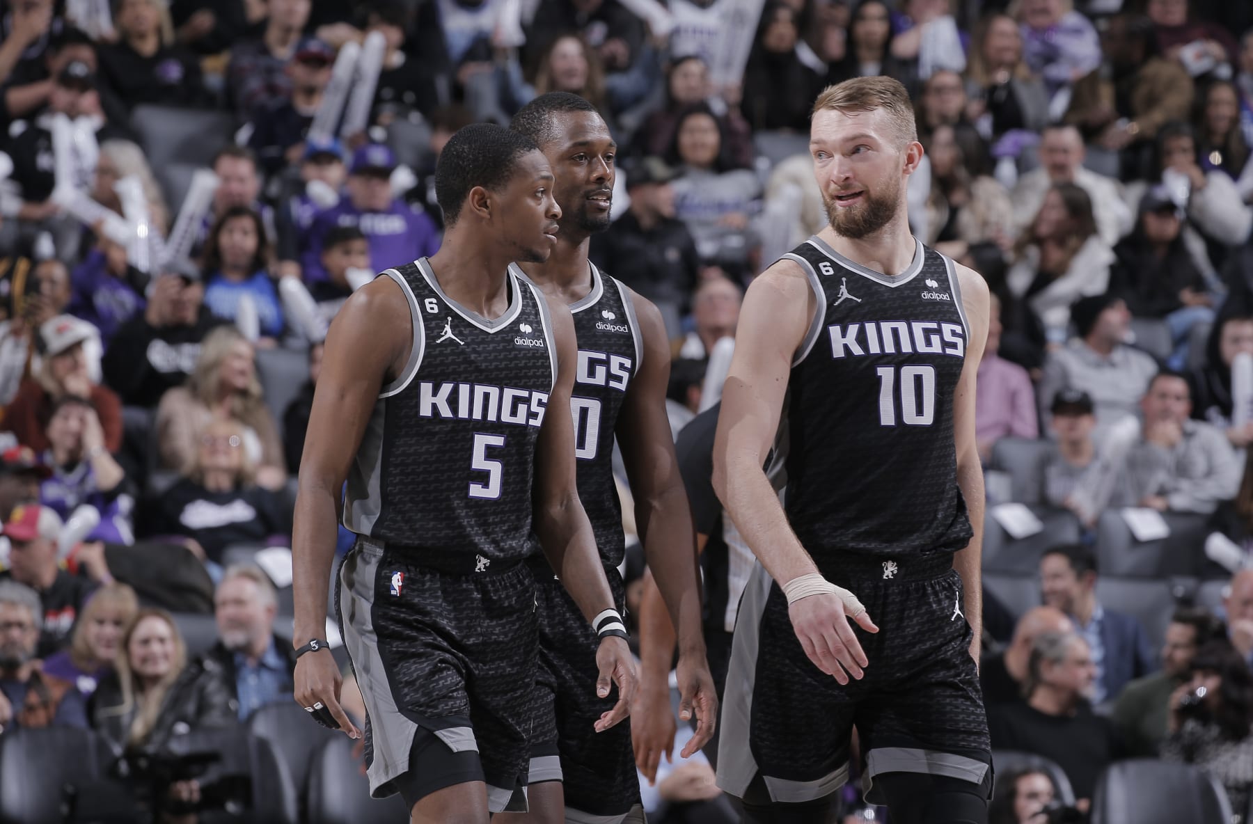SACRAMENTO, CA - MARCH 3: DeAaron Fox #5, Harrison Barnes #40, and Domantas Sabonis #10 of the Sacramento Kings talk during the game against the Los Angeles Clippers on March 3, 2023 at Golden 1 Center in Sacramento, California. NOTE TO USER: User expressly acknowledges and agrees that, by downloading and or using this photograph, User is consenting to the terms and conditions of the Getty Images Agreement. Mandatory Copyright Notice: Copyright 2023 NBAE (Photo by Rocky Widner/NBAE via Getty Images)