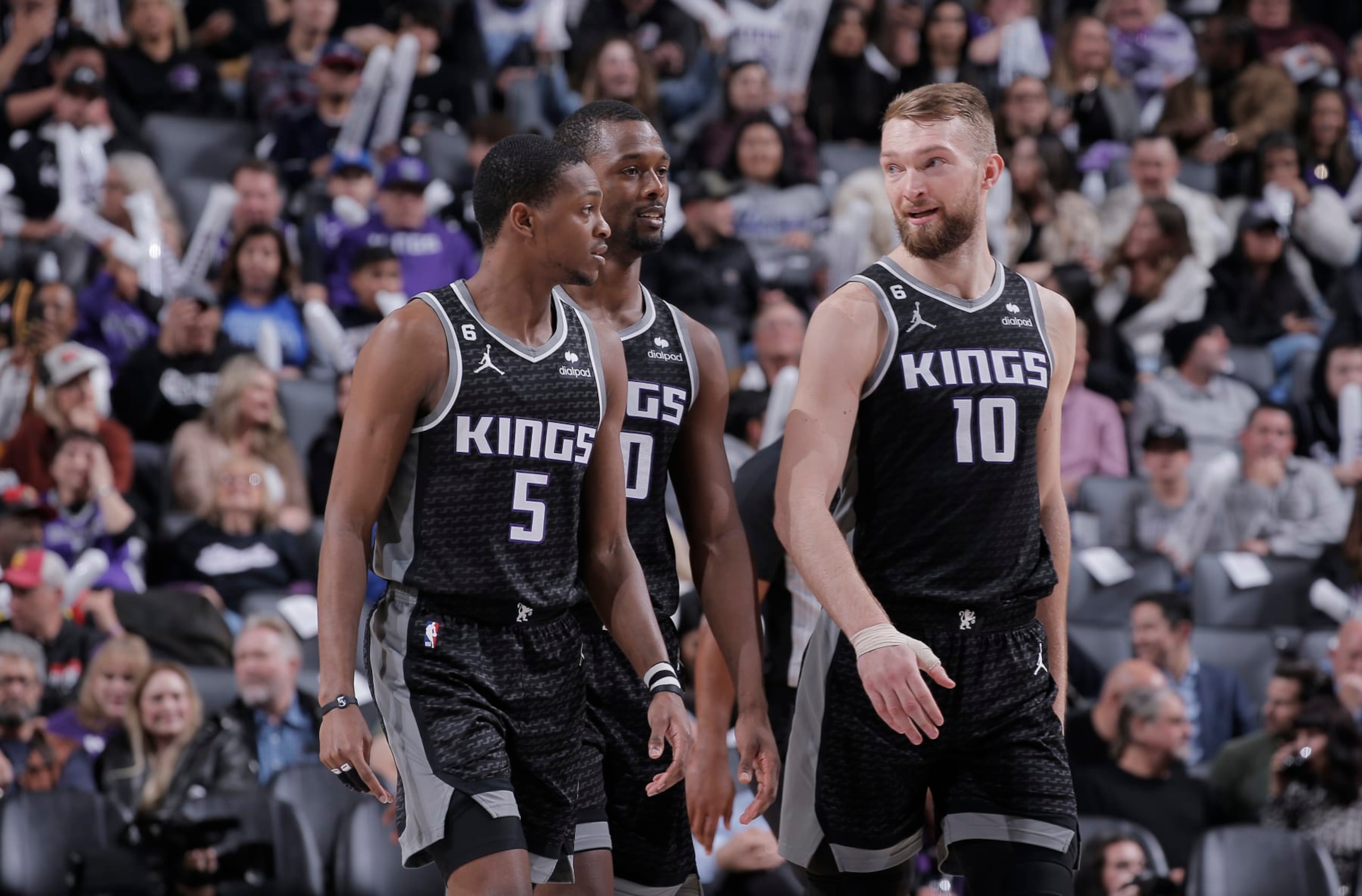 SACRAMENTO, CA - MARCH 3: DeAaron Fox #5, Harrison Barnes #40, and Domantas Sabonis #10 of the Sacramento Kings talk during the game against the Los Angeles Clippers on March 3, 2023 at Golden 1 Center in Sacramento, California. NOTE TO USER: User expressly acknowledges and agrees that, by downloading and or using this photograph, User is consenting to the terms and conditions of the Getty Images Agreement. Mandatory Copyright Notice: Copyright 2023 NBAE (Photo by Rocky Widner/NBAE via Getty Images)