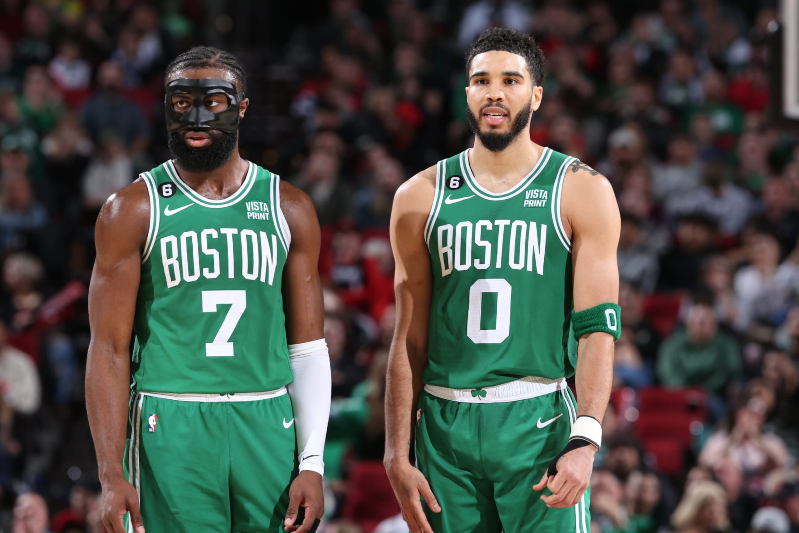 PORTLAND, OR - MARCH 17: Jaylen Brown #7 and Jayson Tatum #0 of the Boston Celtics looks on during the game against the Portland Trail Blazers  on March 17, 2023 at the Moda Center Arena in Portland, Oregon. NOTE TO USER: User expressly acknowledges and agrees that, by downloading and or using this photograph, user is consenting to the terms and conditions of the Getty Images License Agreement. Mandatory Copyright Notice: Copyright 2023 NBAE (Photo by Sam Forencich/NBAE via Getty Images)