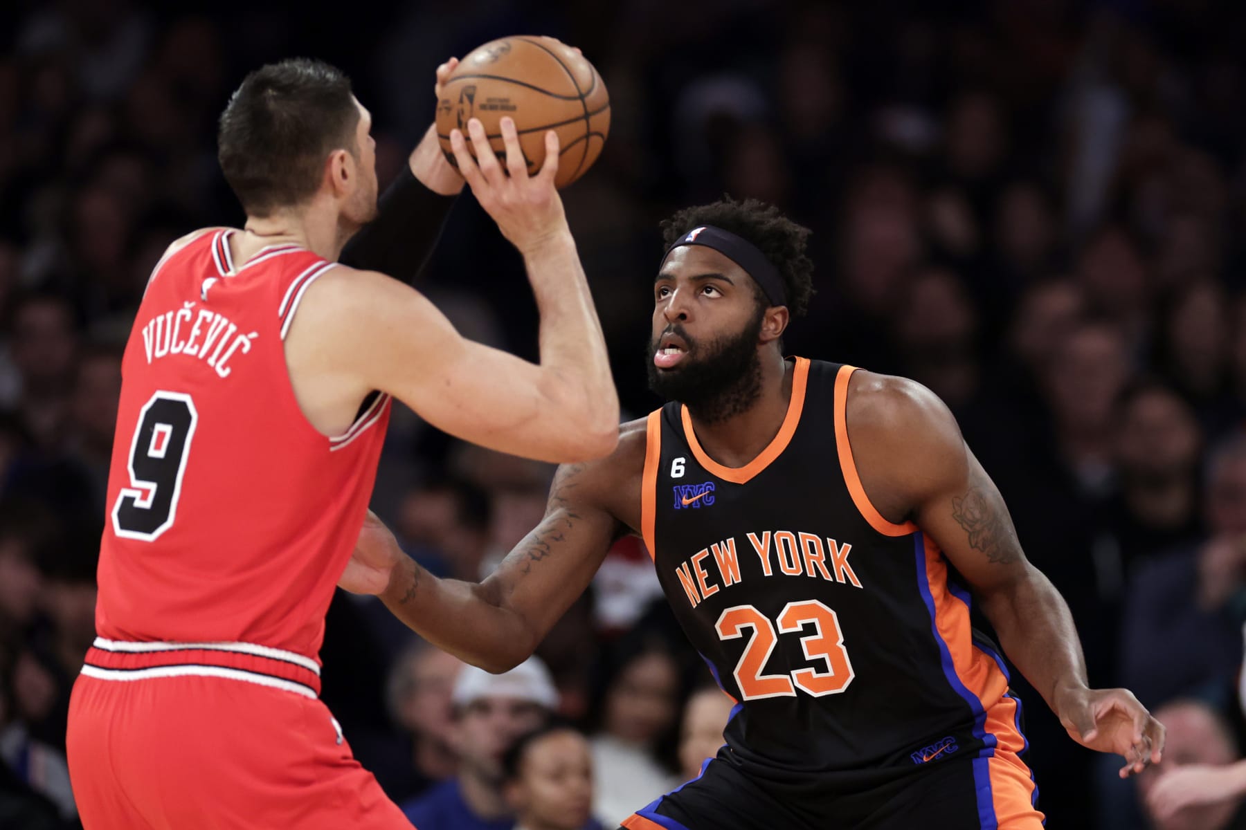 NEW YORK, NEW YORK - DECEMBER 23: Mitchell Robinson #23 of the New York Knicks in action against the Chicago Bulls during the first half at Madison Square Garden on December 23, 2022 in New York City. NOTE TO USER: User expressly acknowledges and agrees that, by downloading and or using this Photograph, user is consenting to the terms and conditions of the Getty Images License Agreement.  (Photo by Adam Hunger/Getty Images)