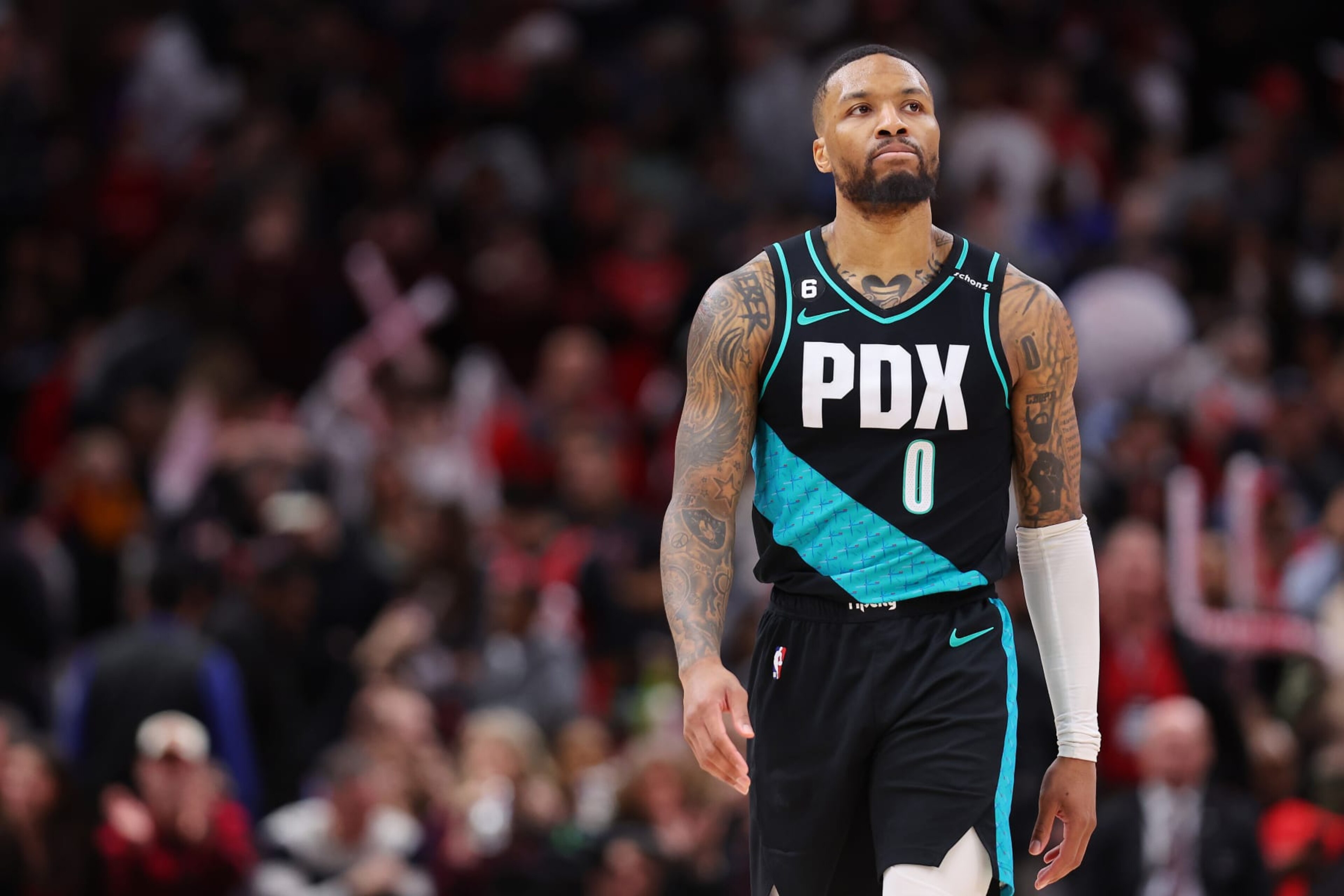 CHICAGO, ILLINOIS - FEBRUARY 04: Damian Lillard #0 of the Portland Trail Blazers looks on against the Chicago Bulls during the first half at United Center on February 04, 2023 in Chicago, Illinois. NOTE TO USER: User expressly acknowledges and agrees that, by downloading and or using this photograph, User is consenting to the terms and conditions of the Getty Images License Agreement. (Photo by Michael Reaves/Getty Images) CHICAGO, ILLINOIS - FEBRUARY 04: Damian Lillard #0 of the Portland Trail Blazers looks on against the Chicago Bulls during the first half at United Center on February 04, 2023 in Chicago, Illinois. NOTE TO USER: User expressly acknowledges and agrees that, by downloading and or using this photograph, User is consenting to the terms and conditions of the Getty Images License Agreement. (Photo by Michael Reaves/Getty Images)