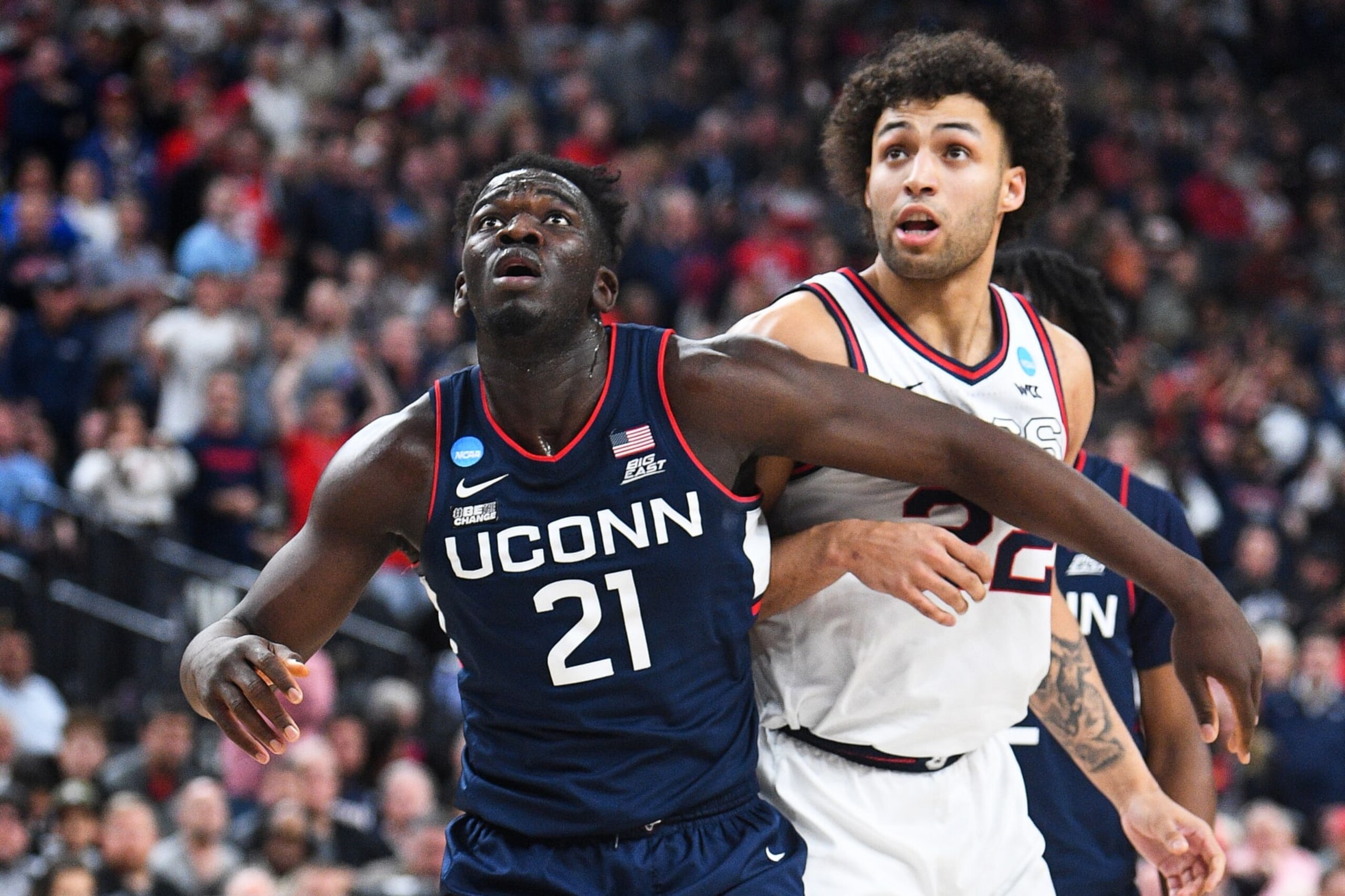 LAS VEGAS, NV - MARCH 25: UConn Huskies forward Adama Sanogo (21) boxes out Gonzaga forward Anton Watson (22) during the NCAA Division I Men's Championship Elite Eight round basketball game between the Gonzaga Bulldogs and the UConn Huskies on March 25, 2023 at T-Mobile Arena in Las Vegas, NV. (Photo by Brian Rothmuller/Icon Sportswire via Getty Images)