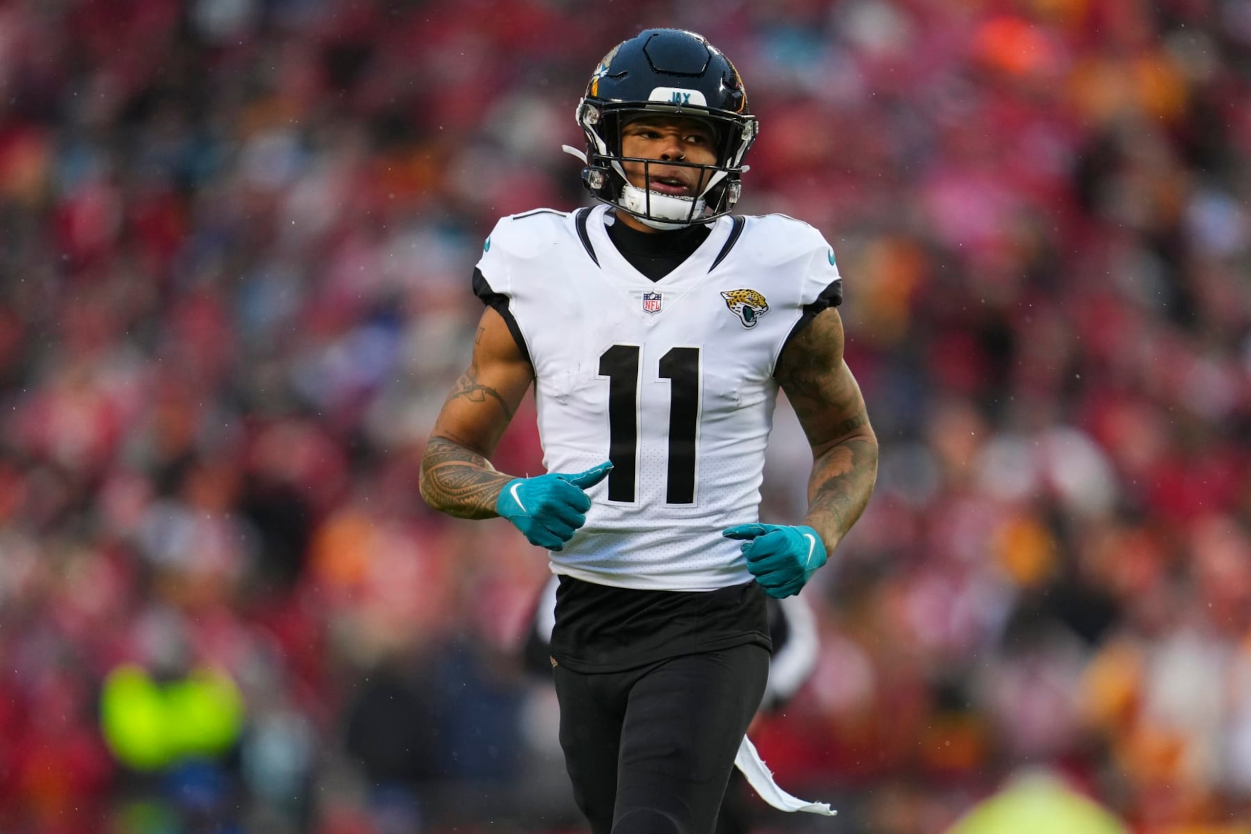 KANSAS CITY, MO - JANUARY 21: Marvin Jones Jr. #11 of the Jacksonville Jaguars gets set against the Kansas City Chiefs at GEHA Field at Arrowhead Stadium on January 21, 2023 in Kansas City, Missouri. (Photo by Cooper Neill/Getty Images) KANSAS CITY, MO - JANUARY 21: Marvin Jones Jr. #11 of the Jacksonville Jaguars gets set against the Kansas City Chiefs at GEHA Field at Arrowhead Stadium on January 21, 2023 in Kansas City, Missouri. (Photo by Cooper Neill/Getty Images)