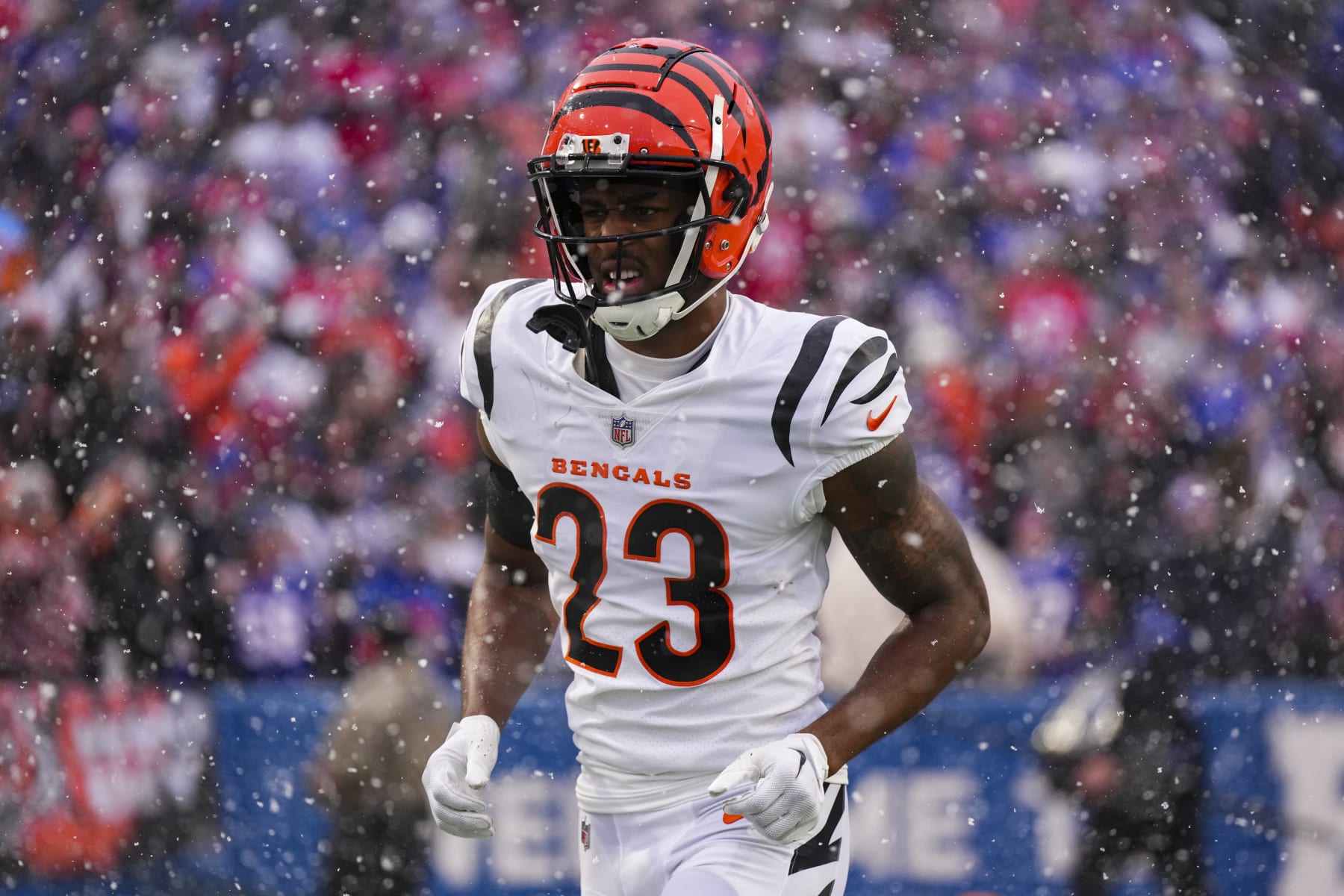 ORCHARD PARK, NY - JANUARY 22: Dax Hill #23 of the Cincinnati Bengals runs onto the field during introductions against the Buffalo Bills at Highmark Stadium on January 22, 2023 in Orchard Park, New York. (Photo by Cooper Neill/Getty Images)