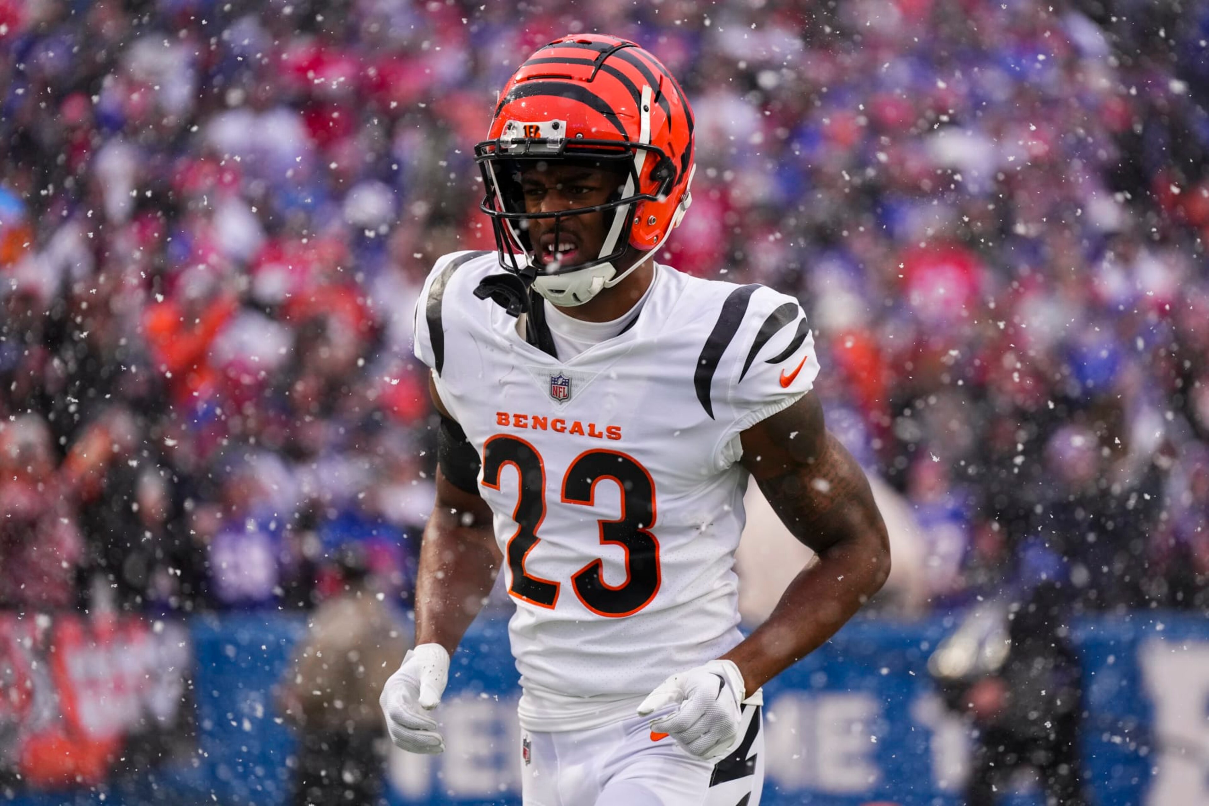ORCHARD PARK, NY - JANUARY 22: Dax Hill #23 of the Cincinnati Bengals runs onto the field during introductions against the Buffalo Bills at Highmark Stadium on January 22, 2023 in Orchard Park, New York. (Photo by Cooper Neill/Getty Images) ORCHARD PARK, NY - JANUARY 22: Dax Hill #23 of the Cincinnati Bengals runs onto the field during introductions against the Buffalo Bills at Highmark Stadium on January 22, 2023 in Orchard Park, New York. (Photo by Cooper Neill/Getty Images)
