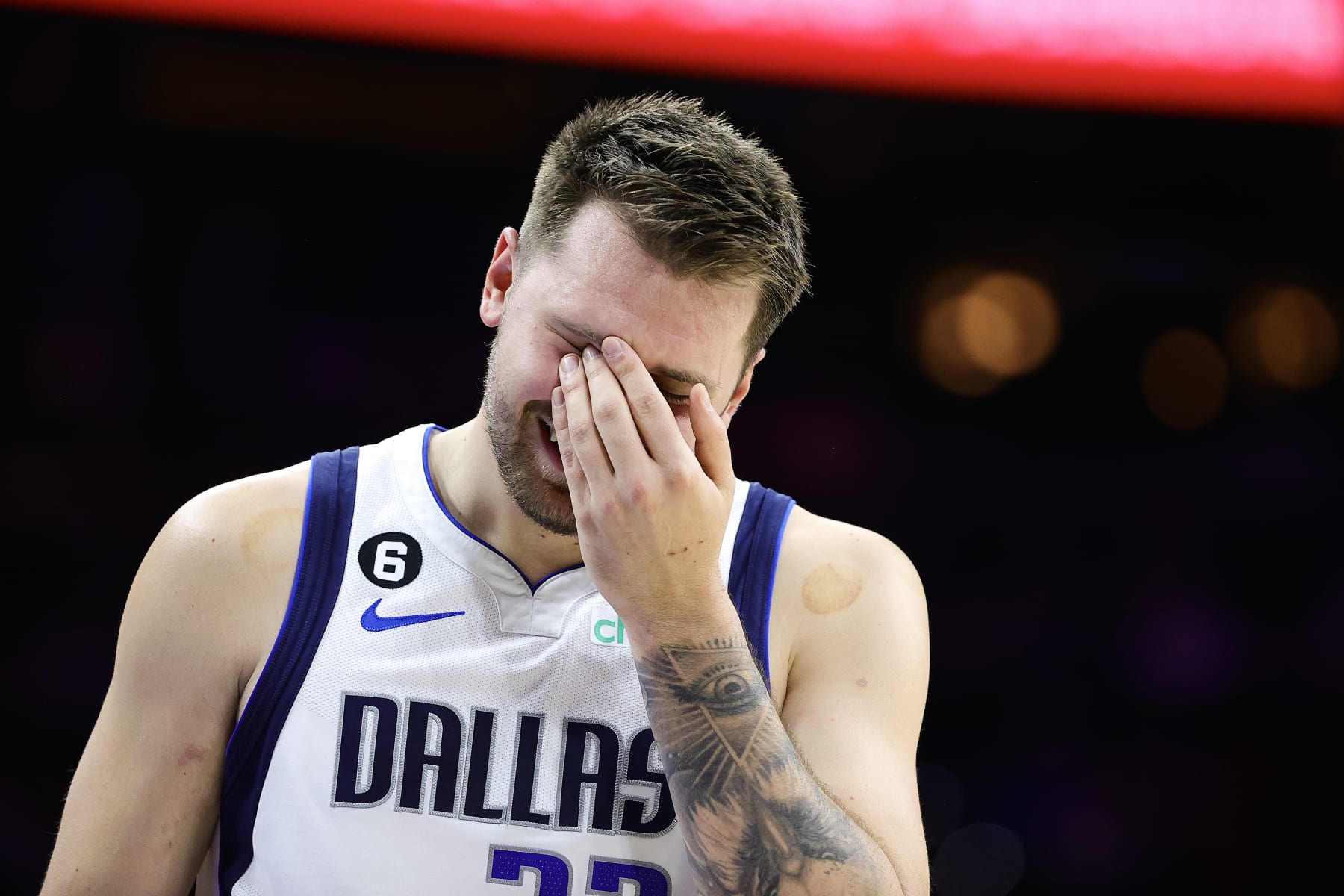 PHILADELPHIA, PENNSYLVANIA - MARCH 29: Luka Doncic #77 of the Dallas Mavericks reacts during the first quarter against the Philadelphia 76ers at Wells Fargo Center on March 29, 2023 in Philadelphia, Pennsylvania. NOTE TO USER: User expressly acknowledges and agrees that, by downloading and or using this photograph, User is consenting to the terms and conditions of the Getty Images License Agreement. (Photo by Tim Nwachukwu/Getty Images)