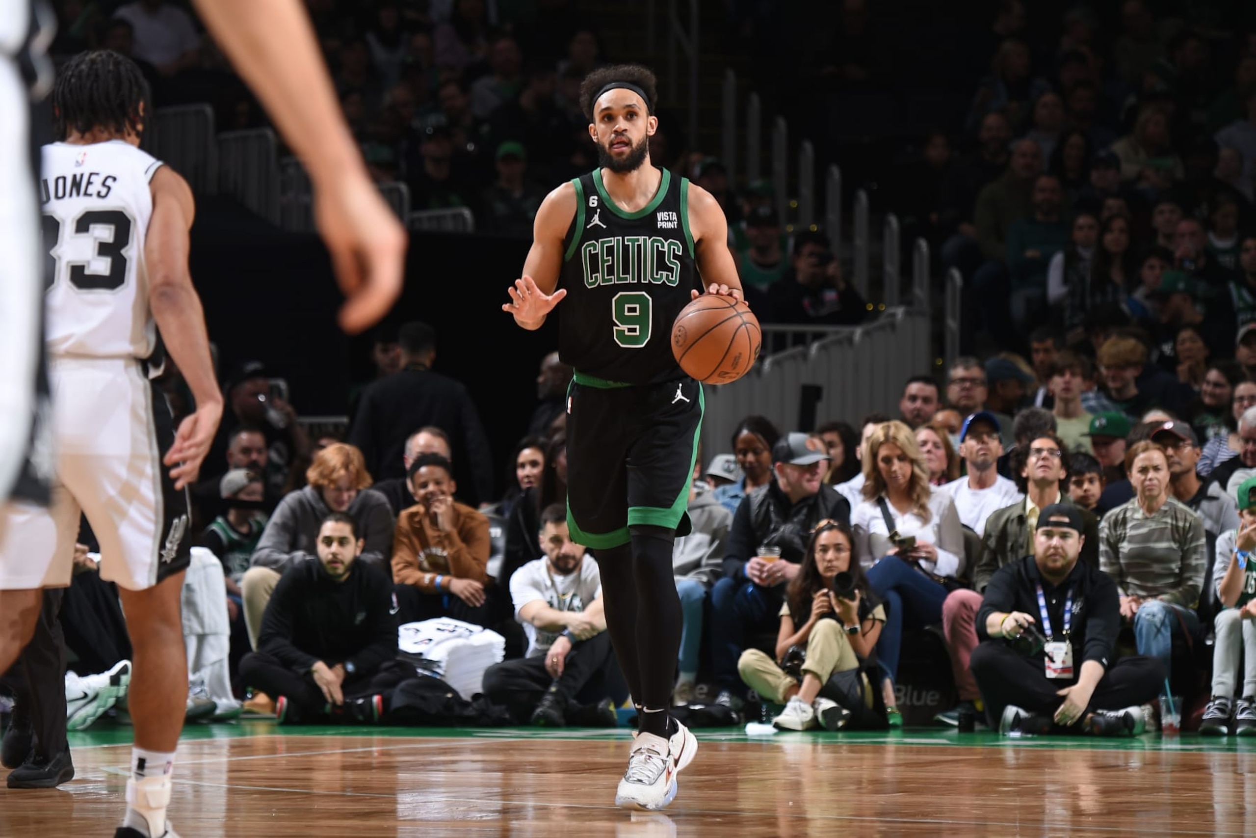 BOSTON, MA - MARCH 26: Derrick White #9 of the Boston Celtics dribbles the ball during the game against the San Antonio Spurs on March 26, 2023 at the TD Garden in Boston, Massachusetts. NOTE TO USER: User expressly acknowledges and agrees that, by downloading and or using this photograph, User is consenting to the terms and conditions of the Getty Images License Agreement. Mandatory Copyright Notice: Copyright 2023 NBAE  (Photo by Brian Babineau/NBAE via Getty Images)