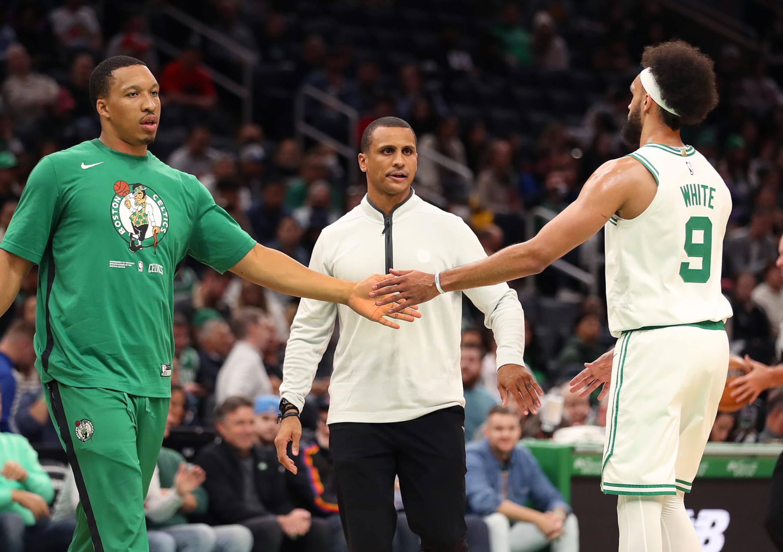 Boston, MA - October 5: Boston Celtics interim head coach Joe Mazzulla greets his players during a 1st quarter timeout. The Celtics lost to the Toronto Raptors, 125-119. (Photo by John Tlumacki/The Boston Globe via Getty Images)