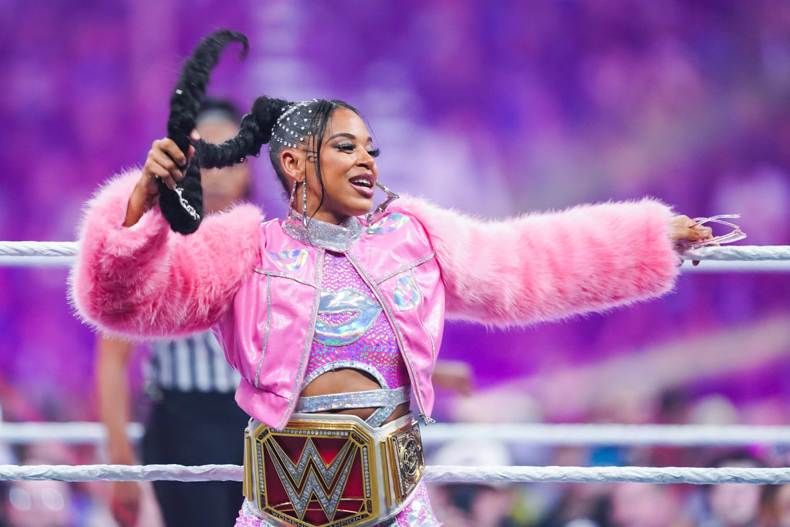 SAN ANTONIO, TEXAS - JANUARY 28: Bianca Belair is introduced prior to the Raw Women's championship during the WWE Royal Rumble event at the Alamodome on January 28, 2023 in San Antonio, Texas. (Photo by Alex Bierens de Haan/Getty Images)