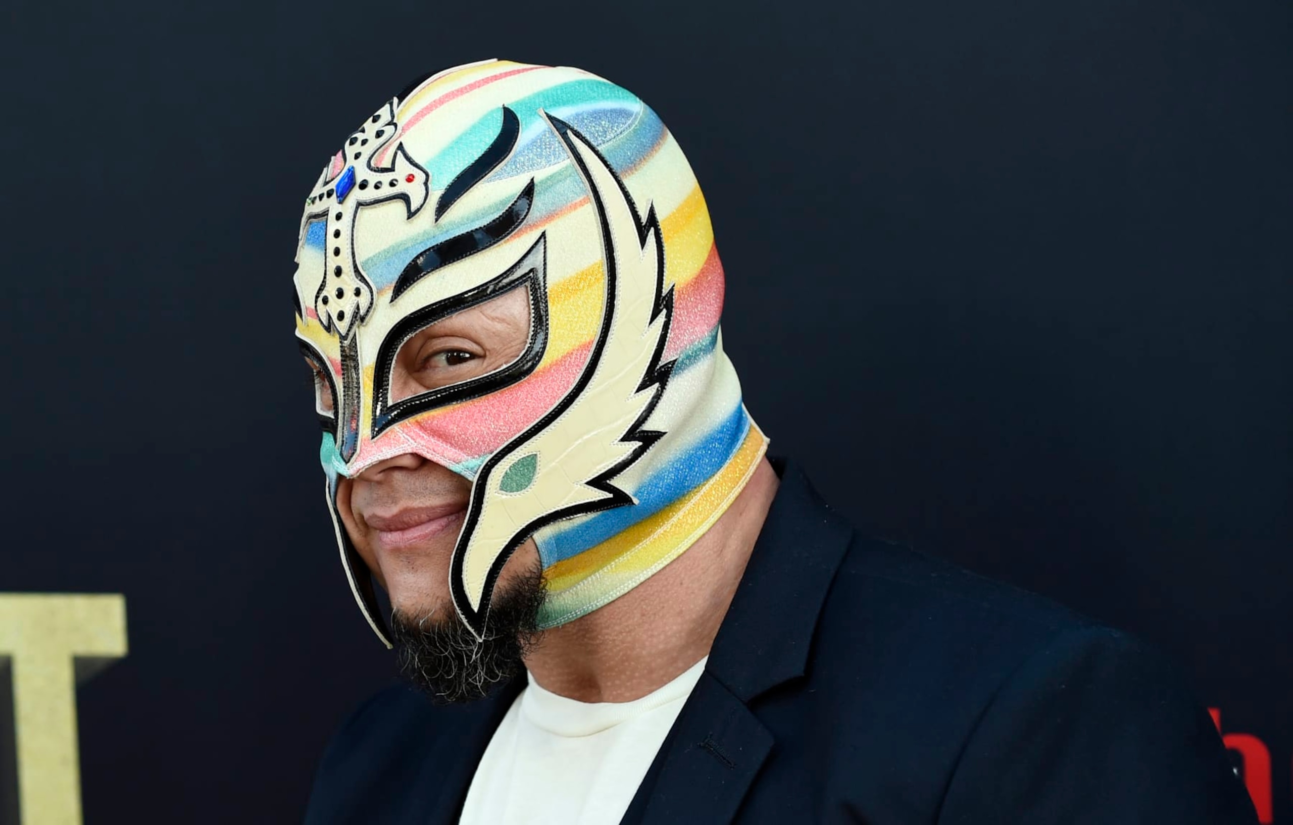 FILE - Professional wrestler Rey Mysterio poses at the premiere of the HBO documentary film "Andre the Giant" at the ArcLight Hollywood on Thursday, March 29, 2018, in Los Angeles. Mysterio was revealed Thursday, Jan 20, 2022, as the cover star of the WWE 2K22 video game. (Photo by Chris Pizzello/Invision/AP)