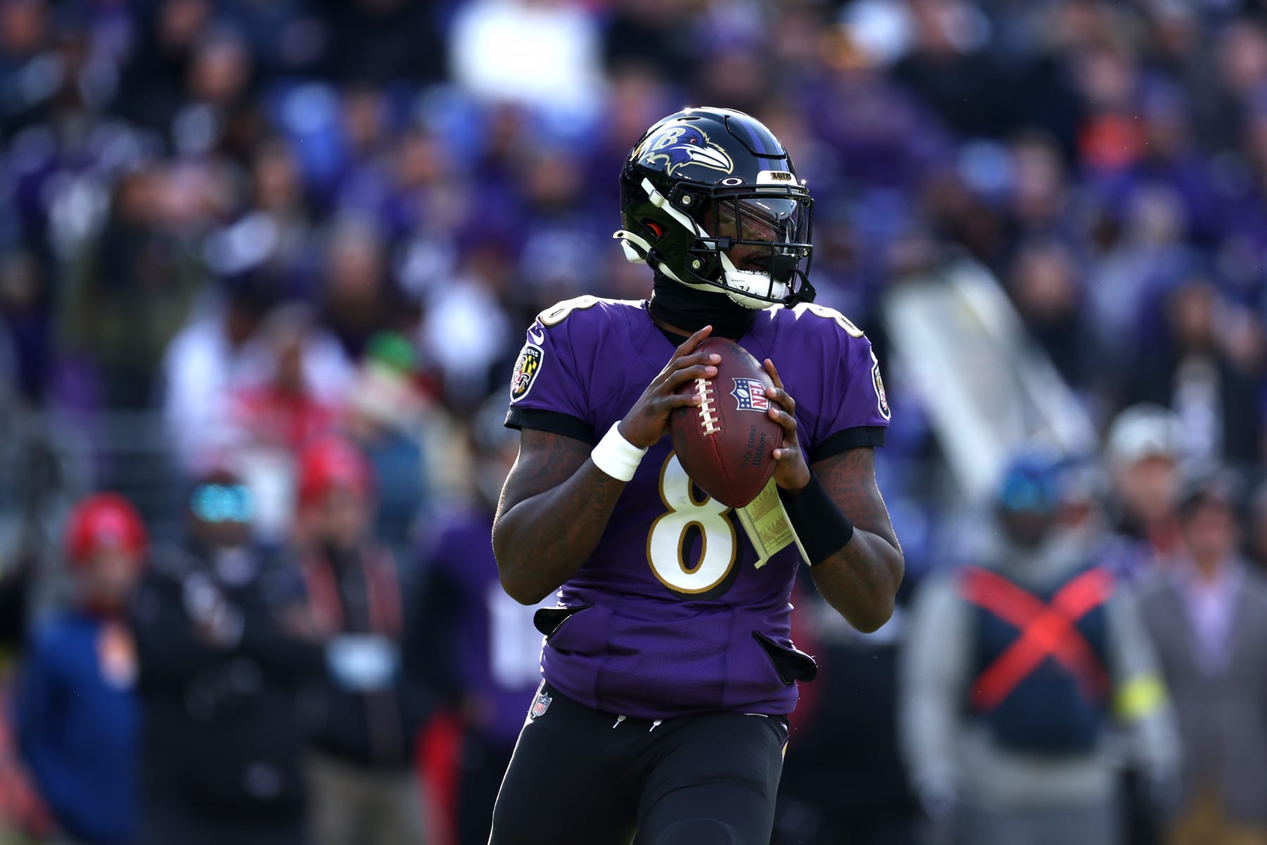 BALTIMORE, MARYLAND - DECEMBER 04: Quarterback Lamar Jackson #8 of the Baltimore Ravens drops back to pass against the Denver Broncos at M&T Bank Stadium on December 04, 2022 in Baltimore, Maryland. (Photo by Rob Carr/Getty Images)