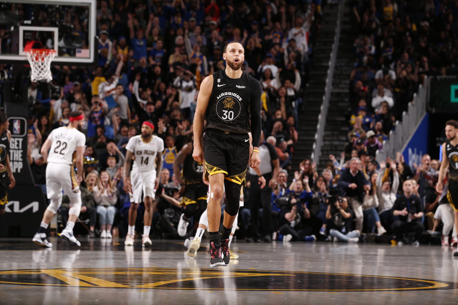 SAN FRANCISCO, CA - MARCH 28: Stephen Curry #30 of the Golden State Warriors celebrates during the game against the New Orleans Pelicans on March 28, 2023 at Chase Center in San Francisco, California. NOTE TO USER: User expressly acknowledges and agrees that, by downloading and or using this photograph, user is consenting to the terms and conditions of Getty Images License Agreement. Mandatory Copyright Notice: Copyright 2023 NBAE (Photo by Jed Jacobsohn/NBAE via Getty Images)