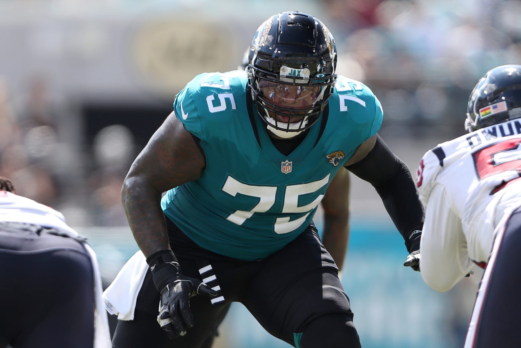 JACKSONVILLE, FLORIDA - OCTOBER 09: Jawaan Taylor #75 of the Jacksonville Jaguars in action during the first half of the game against the Houston Texans at TIAA Bank Field on October 09, 2022 in Jacksonville, Florida. (Photo by Courtney Culbreath/Getty Images)