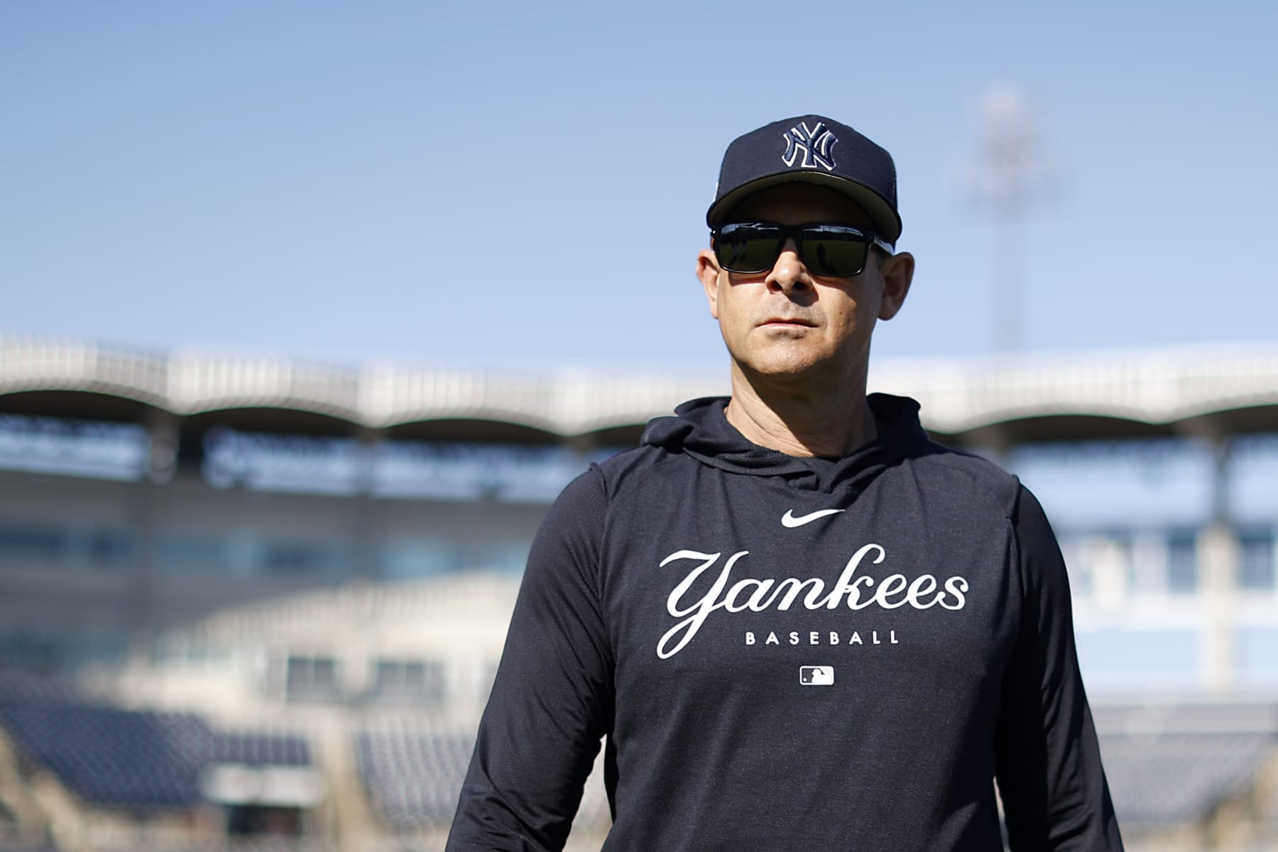 TAMPA, FL - FEBRUARY 26: Manager, Aaron Boone #17 of the New York Yankees looks on before a spring training game against the Atlanta Braves at George M. Steinbrenner Field on February 26, 2023 in Tampa, Florida. (Photo by New York Yankees/Getty Images)