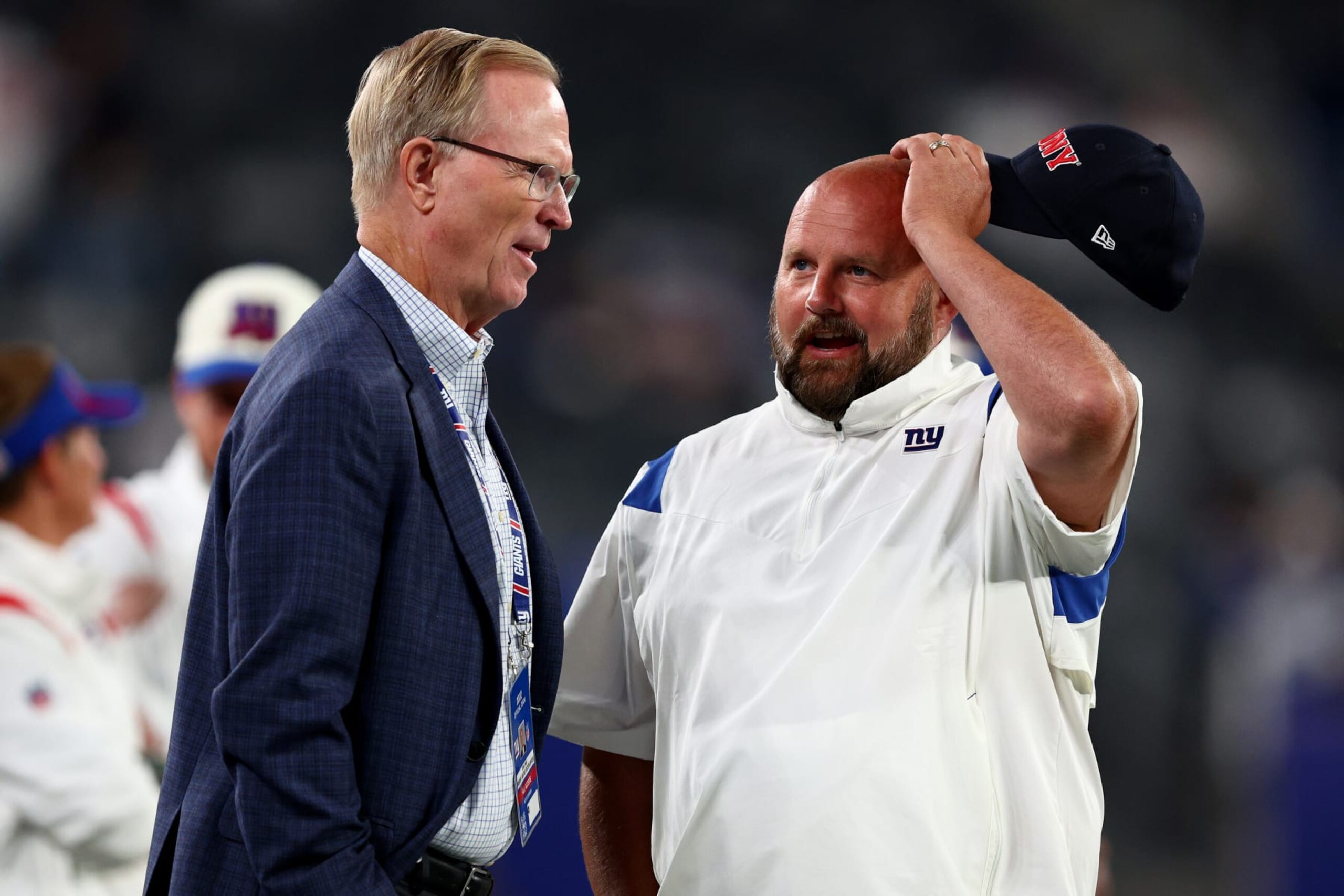 EAST RUTHERFORD, NEW JERSEY - SEPTEMBER 26: (L-R) President and CEO John K. Mara of the New York Giants talks with head coach Brian Daboll prior to the game against the Dallas Cowboys at MetLife Stadium on September 26, 2022 in East Rutherford, New Jersey. (Photo by Elsa/Getty Images) EAST RUTHERFORD, NEW JERSEY - SEPTEMBER 26: (L-R) President and CEO John K. Mara of the New York Giants talks with head coach Brian Daboll prior to the game against the Dallas Cowboys at MetLife Stadium on September 26, 2022 in East Rutherford, New Jersey. (Photo by Elsa/Getty Images)