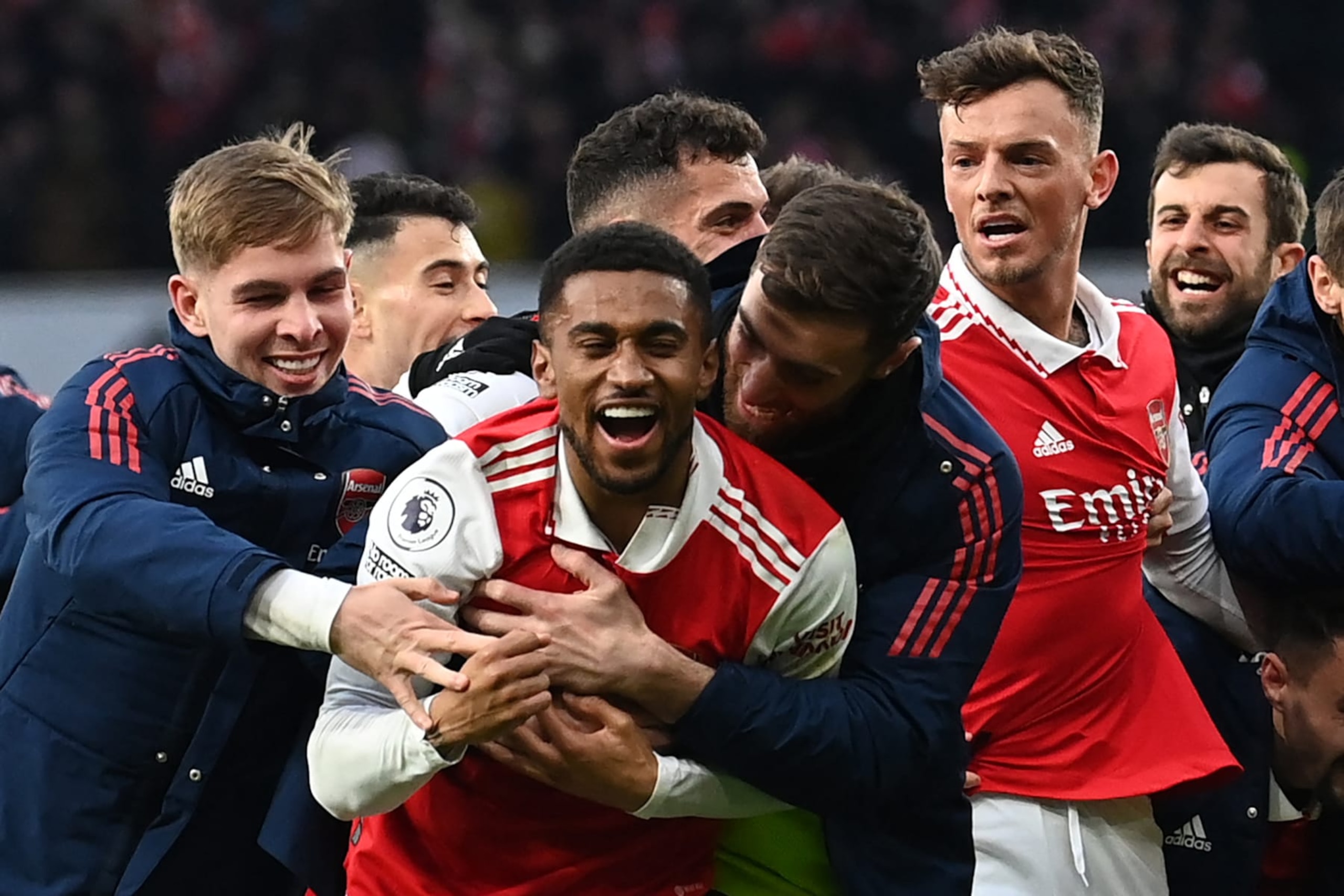 Arsenal's English midfielder Reiss Nelson (C) celebrates after scoring his team third goal of the team during the English Premier League football match between Arsenal and Bournemouth at the Emirates Stadium in London on March 4, 2023. (Photo by Glyn KIRK / AFP) / RESTRICTED TO EDITORIAL USE. No use with unauthorized audio, video, data, fixture lists, club/league logos or 'live' services. Online in-match use limited to 120 images. An additional 40 images may be used in extra time. No video emulation. Social media in-match use limited to 120 images. An additional 40 images may be used in extra time. No use in betting publications, games or single club/league/player publications. /  (Photo by GLYN KIRK/AFP via Getty Images)