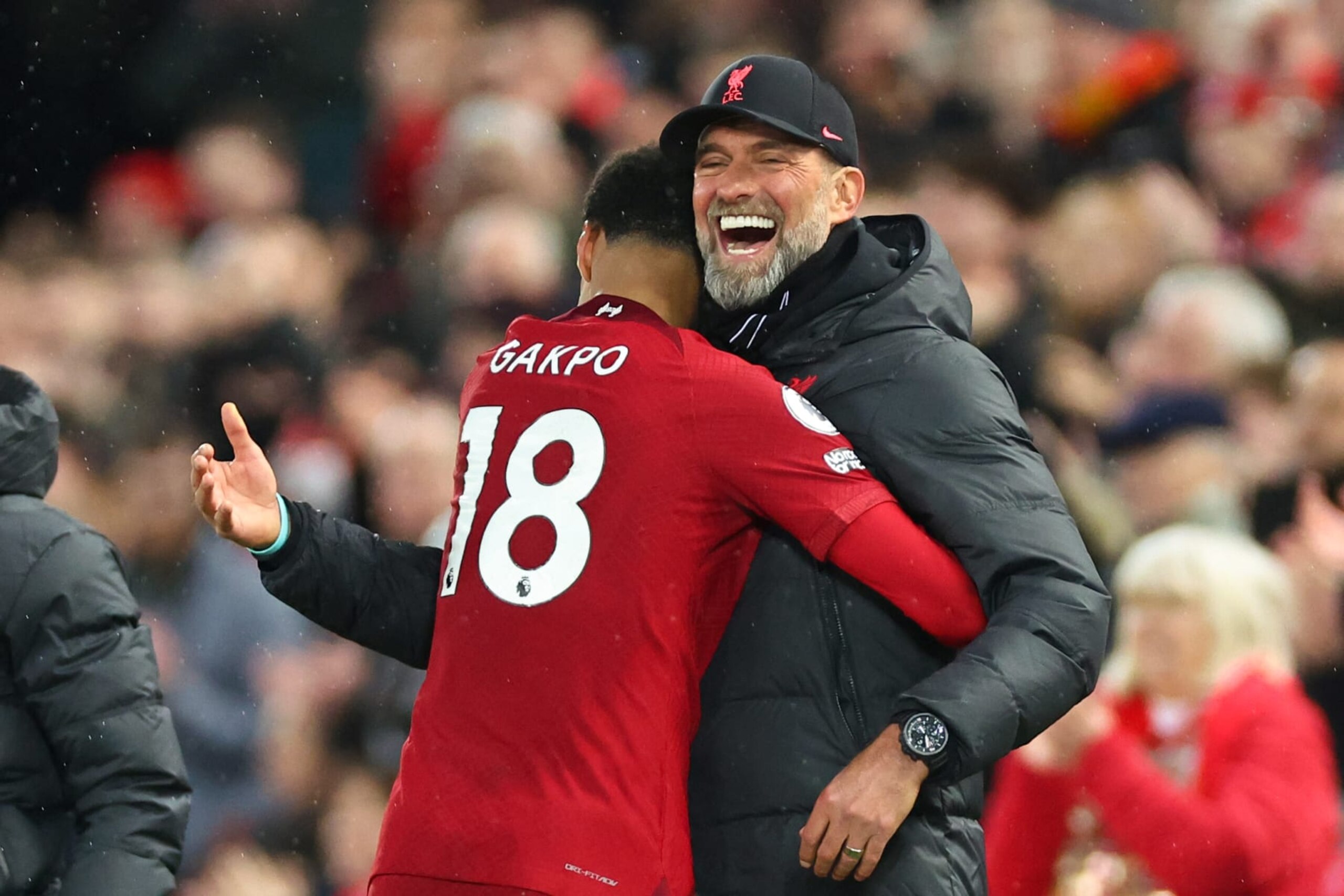 LIVERPOOL, ENGLAND - MARCH 05: Cody Gakpo hugs Jurgen Klopp the head coach / manager of Liverpool after he is substituted during the Premier League match between Liverpool FC and Manchester United at Anfield on March 5, 2023 in Liverpool, United Kingdom. (Photo by Robbie Jay Barratt - AMA/Getty Images)