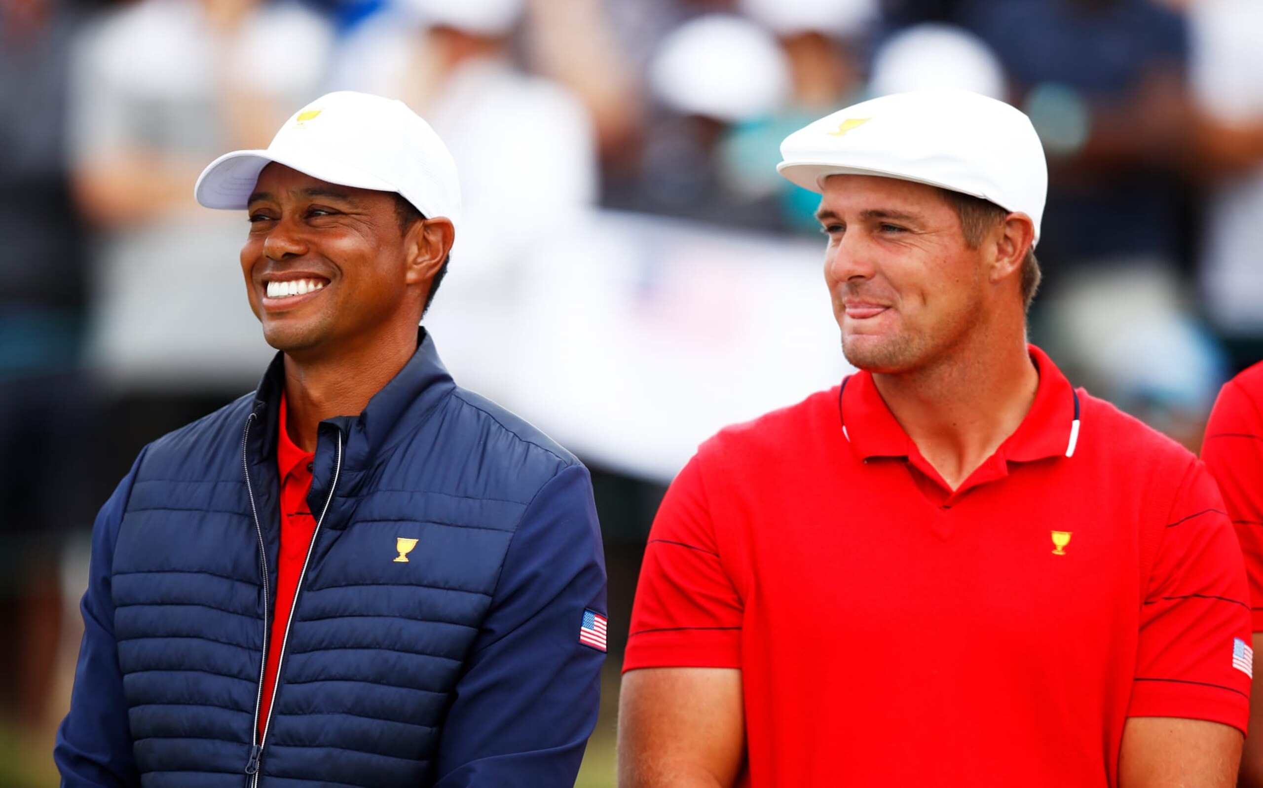 MELBOURNE, AUSTRALIA - DECEMBER 15:  Playing Captain Tiger Woods of the United States team and Bryson DeChambeau of the United States team celebrate after they won the Presidents Cup 16-14 during Sunday Singles matches on day four of the 2019 Presidents Cup at Royal Melbourne Golf Course on December 15, 2019 in Melbourne, Australia. (Photo by Daniel Pockett/Getty Images)