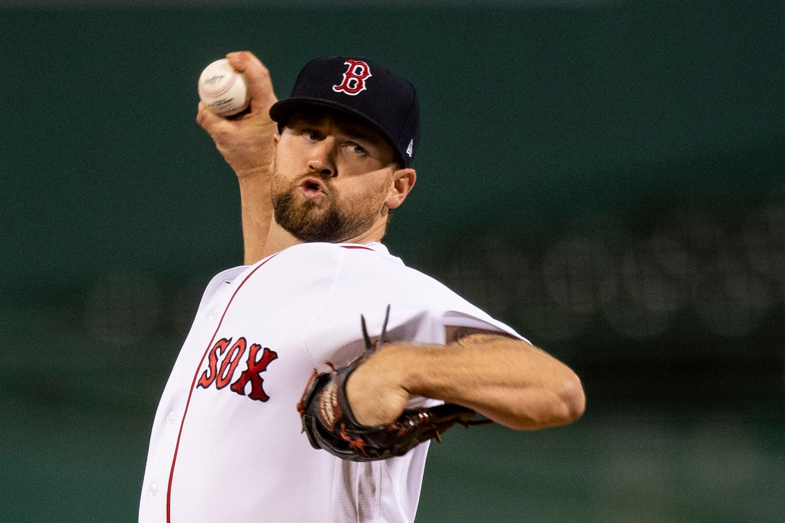 BOSTON, MA - AUGUST 31: Colten Brewer #48 of the Boston Red Sox delivers during the third inning of a game against the Atlanta Braves on August 31, 2020 at Fenway Park in Boston, Massachusetts. The 2020 season had been postponed since March due to the COVID-19 pandemic. (Photo by Billie Weiss/Boston Red Sox/Getty Images)
