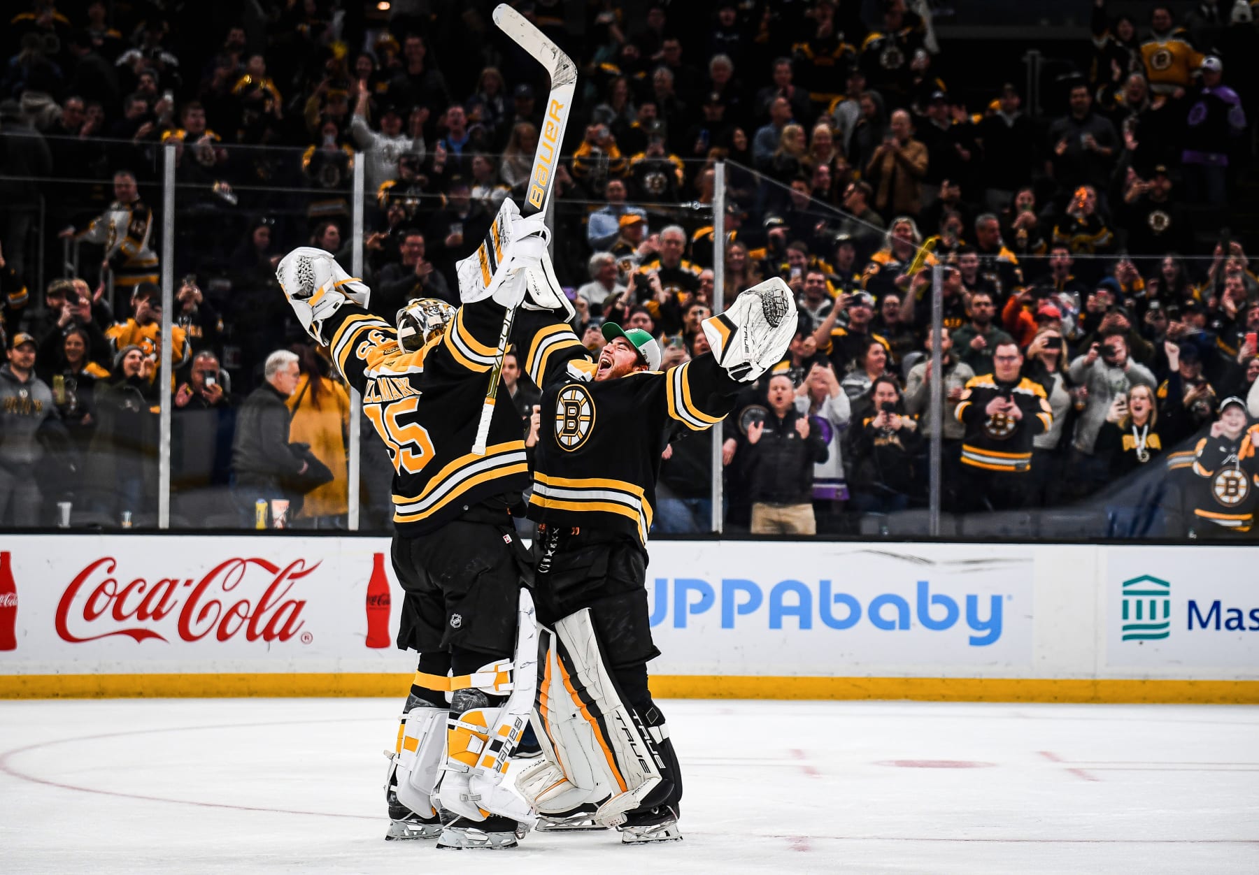BOSTON, MASSACHUSETTS - MARCH 21: Linus Ullmark #35 and Jeremy Swayman #1 of the Boston Bruins celebrate after a win against the Ottawa Senators at TD Garden on March 21, 2023 in Boston, Massachusetts. (Photo by China Wong/NHLI via Getty Images)