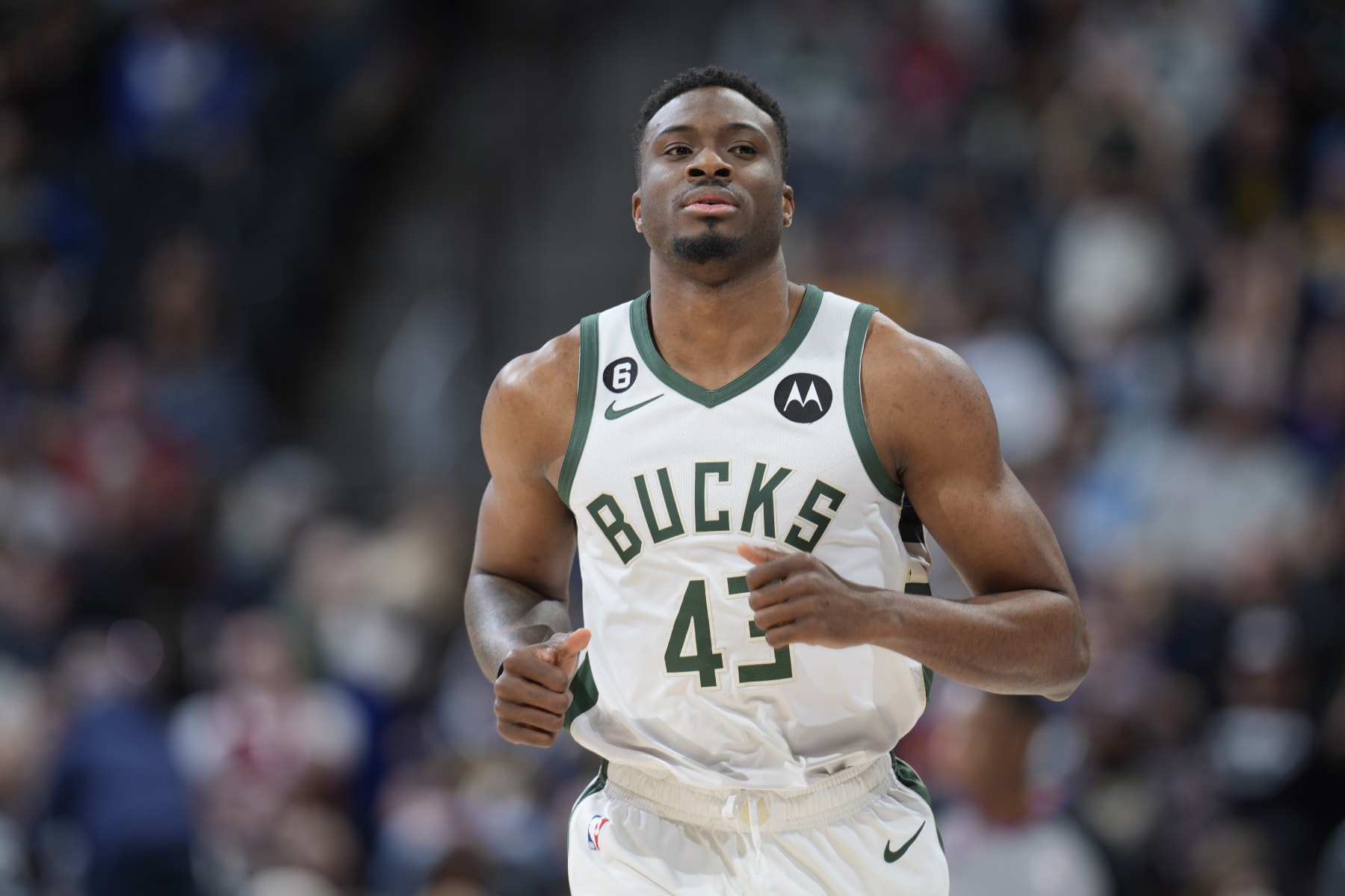 Milwaukee Bucks forward Thanasis Antetokounmpo (43) in the second half of an NBA basketball game Saturday, March 25, 2023, in Denver. (AP Photo/David Zalubowski)