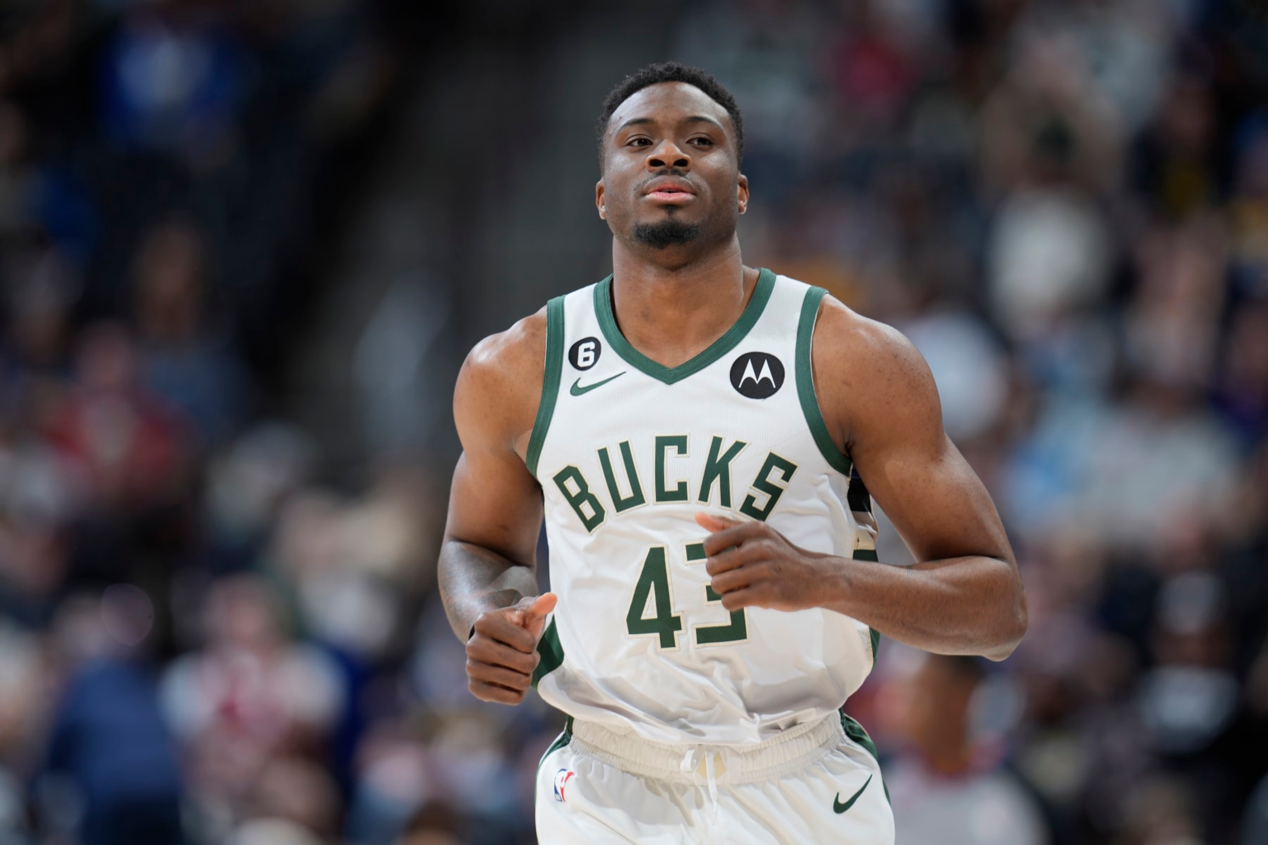 Milwaukee Bucks forward Thanasis Antetokounmpo (43) in the second half of an NBA basketball game Saturday, March 25, 2023, in Denver. (AP Photo/David Zalubowski)