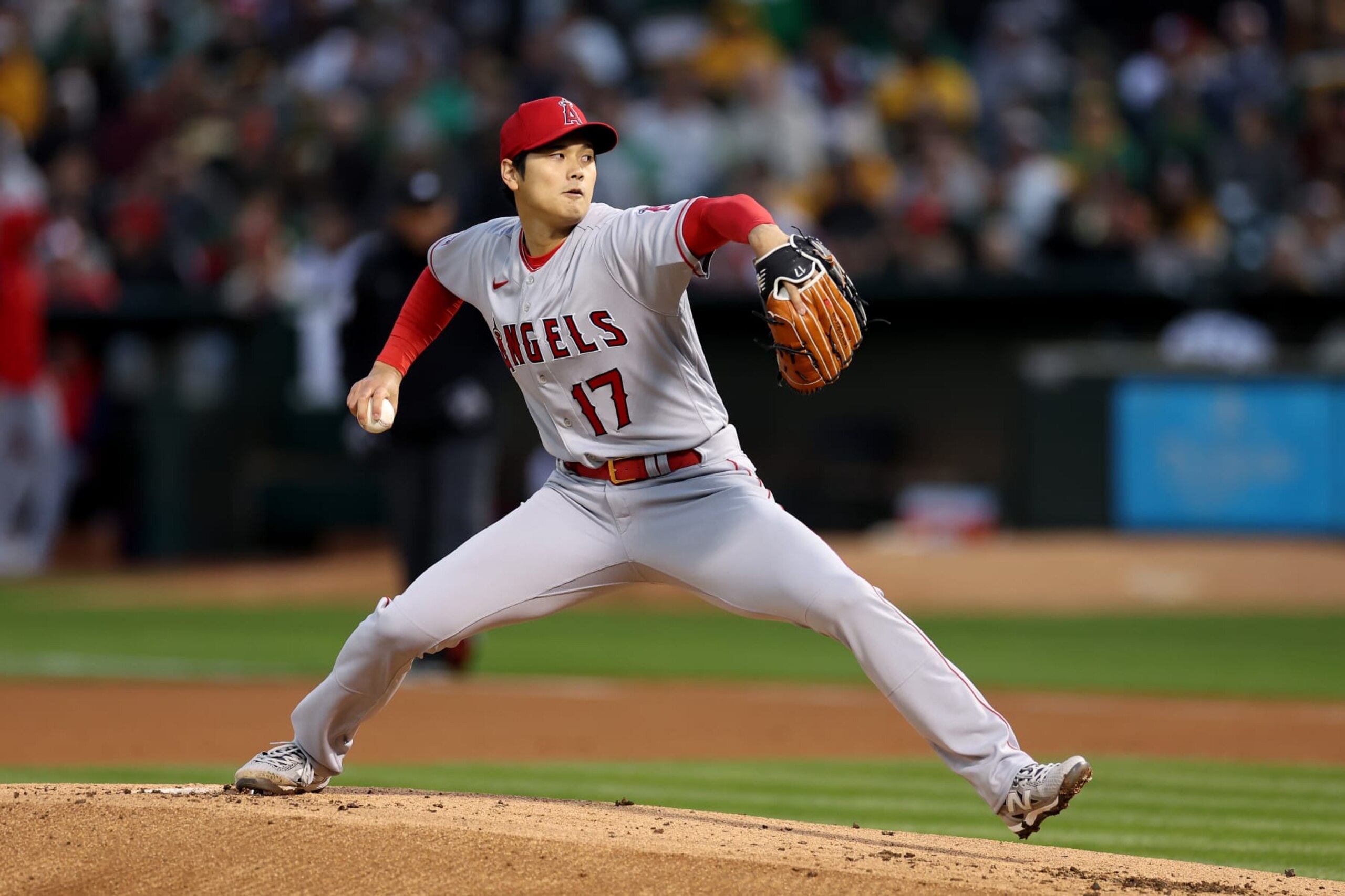 OAKLAND, CALIFORNIA - MARCH 30: Shohei Ohtani #17 of the Los Angeles Angels pitches against the Oakland Athletics on opening day at RingCentral Coliseum on March 30, 2023 in Oakland, California. (Photo by Ezra Shaw/Getty Images)