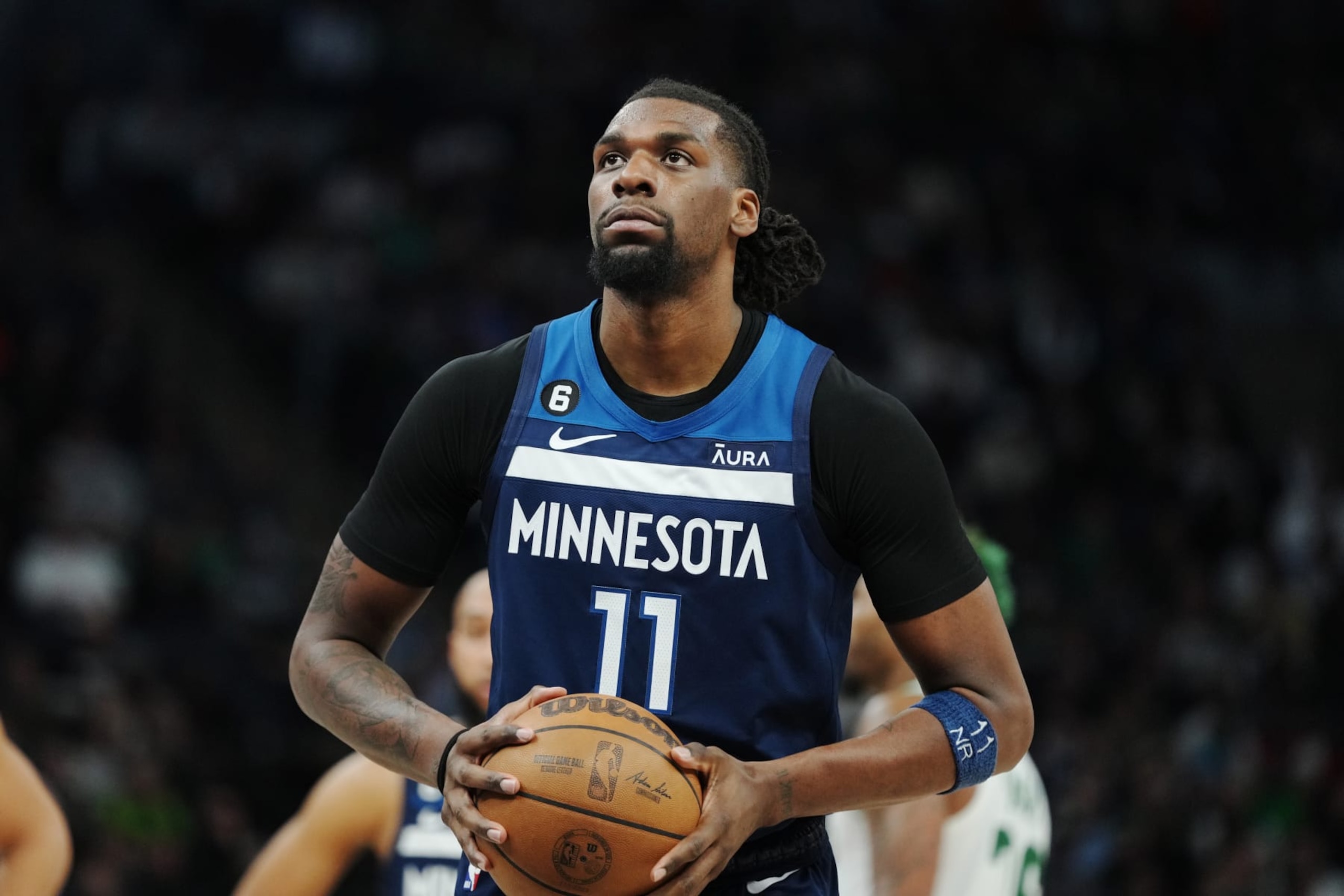 MINNEAPOLIS, MN -  MARCH 15: Naz Reid #11 of the Minnesota Timberwolves shoots a free throw during the game against the Boston Celtics on March 15, 2023 at Target Center in Minneapolis, Minnesota. NOTE TO USER: User expressly acknowledges and agrees that, by downloading and or using this Photograph, user is consenting to the terms and conditions of the Getty Images License Agreement. Mandatory Copyright Notice: Copyright 2023 NBAE (Photo by Jordan Johnson/NBAE via Getty Images)
