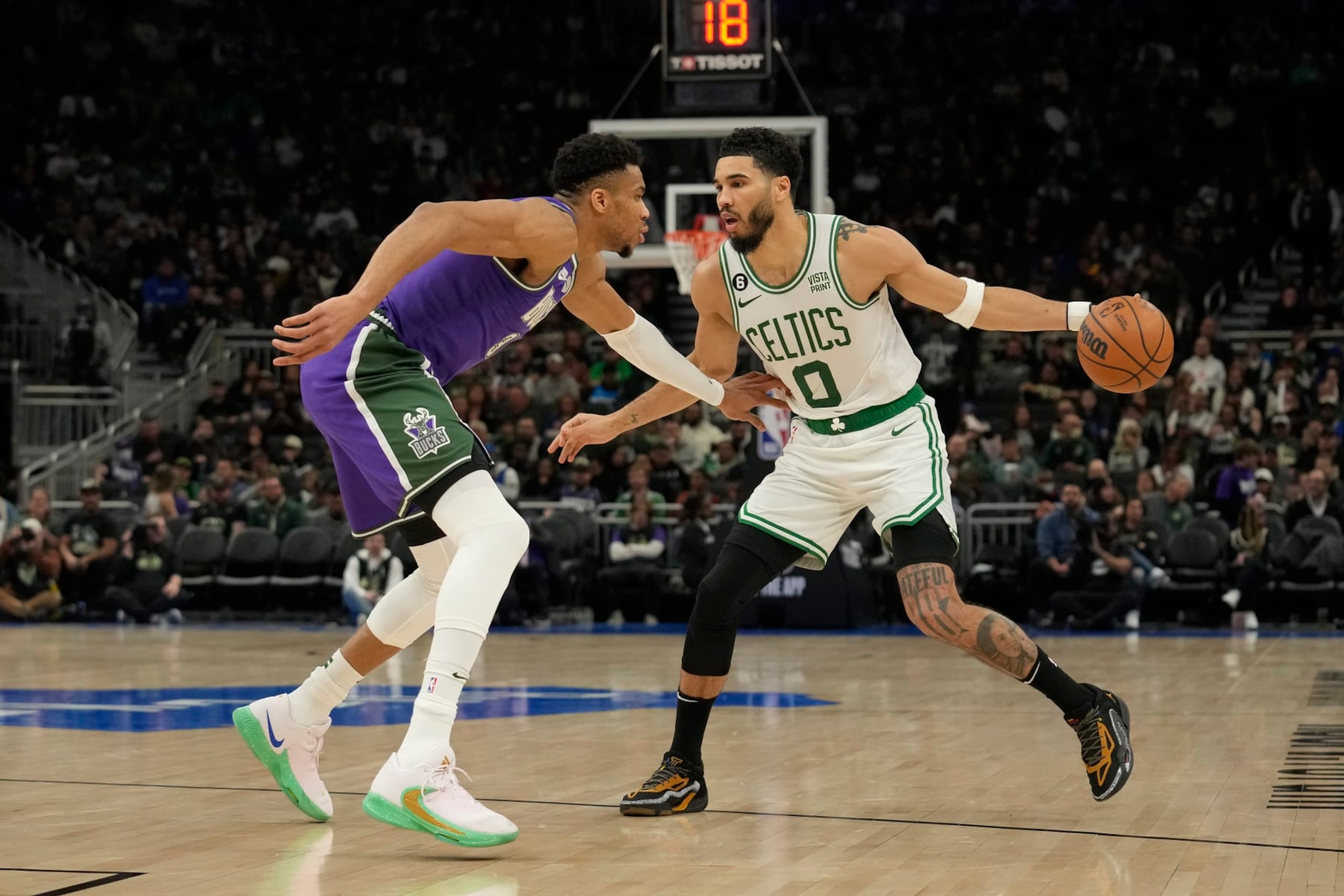 MILWAUKEE, WISCONSIN - MARCH 30: Jayson Tatum #0 of the Boston Celtics dribbles the ball against Giannis Antetokounmpo #34 of the Milwaukee Bucks in the second half at Fiserv Forum on March 30, 2023 in Milwaukee, Wisconsin. NOTE TO USER: User expressly acknowledges and agrees that, by downloading and or using this photograph, user is consenting to the terms and conditions of the Getty Images License Agreement. (Photo by Patrick McDermott/Getty Images) MILWAUKEE, WISCONSIN - MARCH 30: Jayson Tatum #0 of the Boston Celtics dribbles the ball against Giannis Antetokounmpo #34 of the Milwaukee Bucks in the second half at Fiserv Forum on March 30, 2023 in Milwaukee, Wisconsin. NOTE TO USER: User expressly acknowledges and agrees that, by downloading and or using this photograph, user is consenting to the terms and conditions of the Getty Images License Agreement. (Photo by Patrick McDermott/Getty Images)