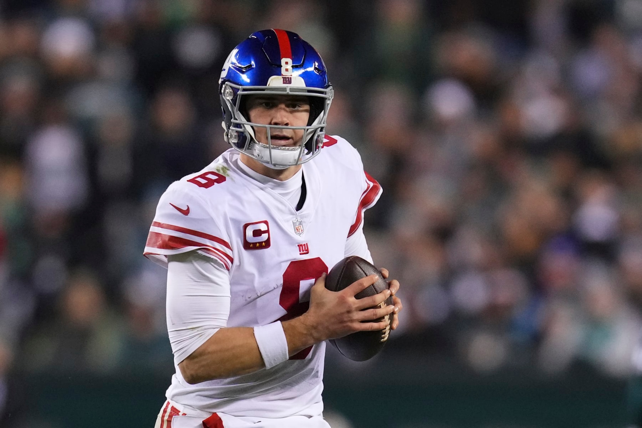 PHILADELPHIA, PA - JANUARY 21: Daniel Jones #8 of the New York Giants runs with the ball against the Philadelphia Eagles during the NFC Divisional Playoff game at Lincoln Financial Field on January 21, 2023 in Philadelphia, Pennsylvania. (Photo by Mitchell Leff/Getty Images)