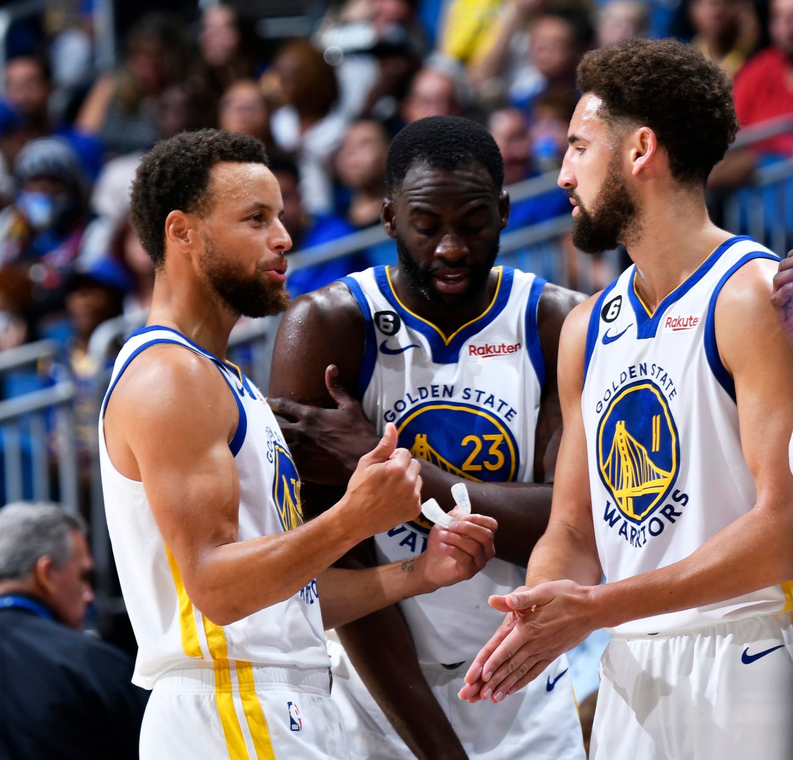 ORLANDO, FL - NOVEMBER 2: Stephen Curry #30 of the Golden State Warriors, Klay Thompson #11, and Draymond Green #23 stand on the court during the game against the Orlando Magic on November 2, 2022 at Amway Center in Orlando, Florida. NOTE TO USER: User expressly acknowledges and agrees that, by downloading and or using this photograph, User is consenting to the terms and conditions of the Getty Images License Agreement. Mandatory Copyright Notice: Copyright 2022 NBAE (Photo by Fernando Medina/NBAE via Getty Images)