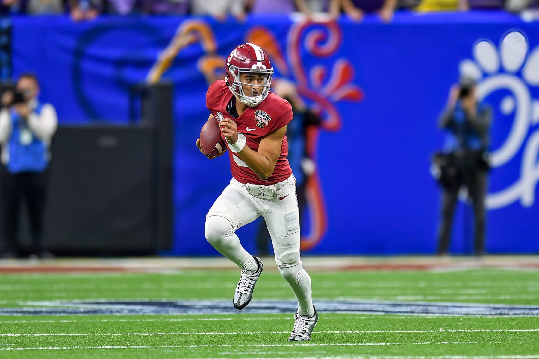 NEW ORLEANS, LA - DECEMBER 31: Alabama quarterback Bryce Young (9) runs the ball during the Allstate Sugar Bowl between the Kansas State Wildcats and the Alabama Crimson Tide on December 31, 2022 at the Caesars Superdome in New Orleans, LA. (Photo by Kevin Langley/Icon Sportswire via Getty Images)