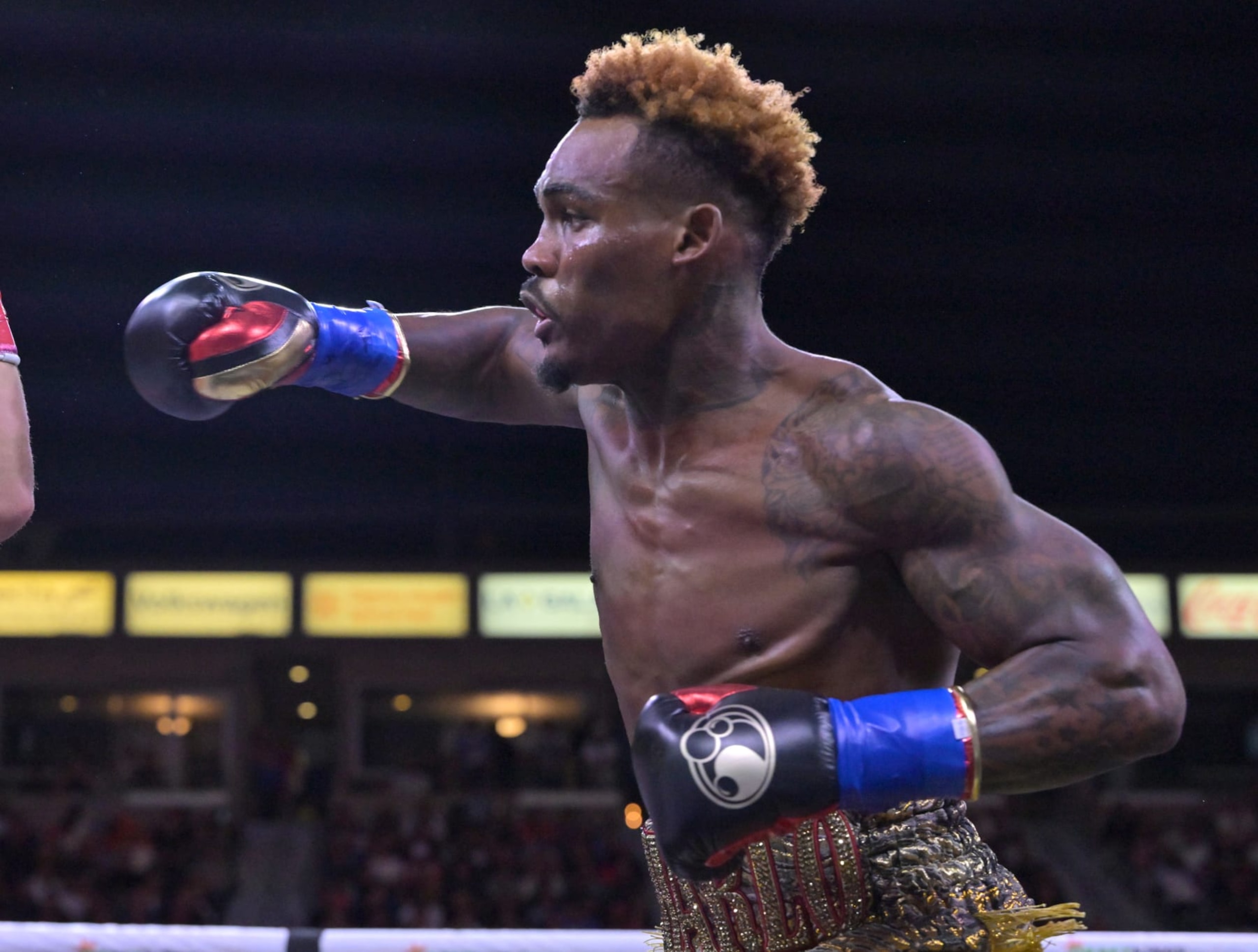 CARSON, CA - MAY 14: Jermell Charlo (gold/red shorts) exchanges punches in the ring with Brian Castano during their super middleweight title fight at Dignity Health Sports Park on May 14, 2022 in Carson, California. Charlo won by knockout in the 10th round. (Photo by Jayne Kamin-Oncea/Getty Images)