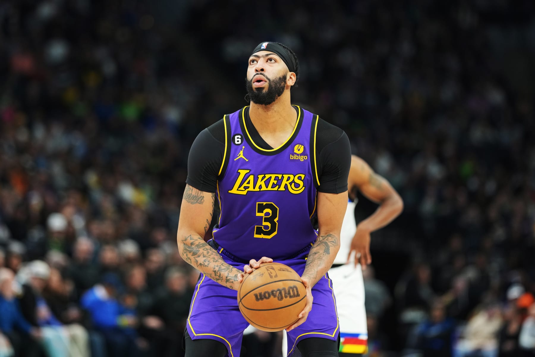 MINNEAPOLIS, MN -  MARCH 31: Anthony Davis #3 of the Los Angeles Lakers shoots a free throw during the game against the Minnesota Timberwolves on March 31, 2023 at Target Center in Minneapolis, Minnesota. NOTE TO USER: User expressly acknowledges and agrees that, by downloading and or using this Photograph, user is consenting to the terms and conditions of the Getty Images License Agreement. Mandatory Copyright Notice: Copyright 2023 NBAE (Photo by Jordan Johnson/NBAE via Getty Images)
