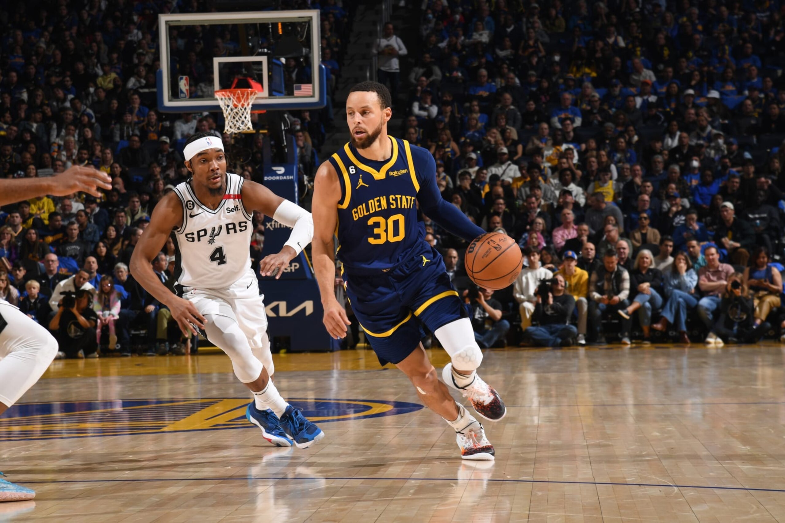 SAN FRANCISCO, CA - MARCH 31: Stephen Curry #30 of the Golden State Warriors dribbles the ball during the game against the San Antonio Spurs on March 31, 2023 at Chase Center in San Francisco, California. NOTE TO USER: User expressly acknowledges and agrees that, by downloading and or using this photograph, user is consenting to the terms and conditions of Getty Images License Agreement. Mandatory Copyright Notice: Copyright 2023 NBAE (Photo by Noah Graham/NBAE via Getty Images)